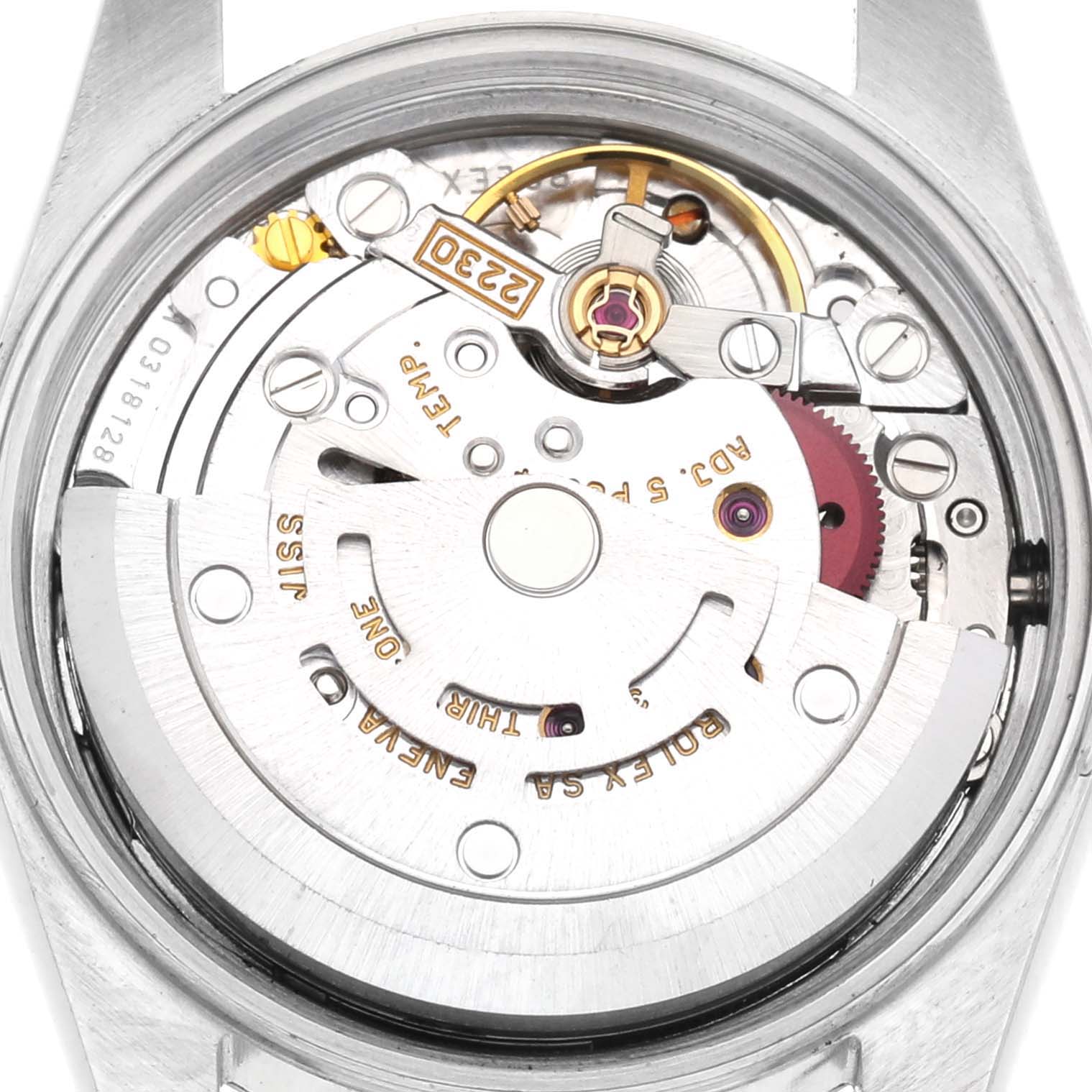 The image shows the movement of a Rolex Oyster Perpetual 76080 Women
s Stainless Steel Blue Dial 76080 Women
s Stainless Steel Blue Dial watch from a rear angle, highlighting its intricate internal mechanism.