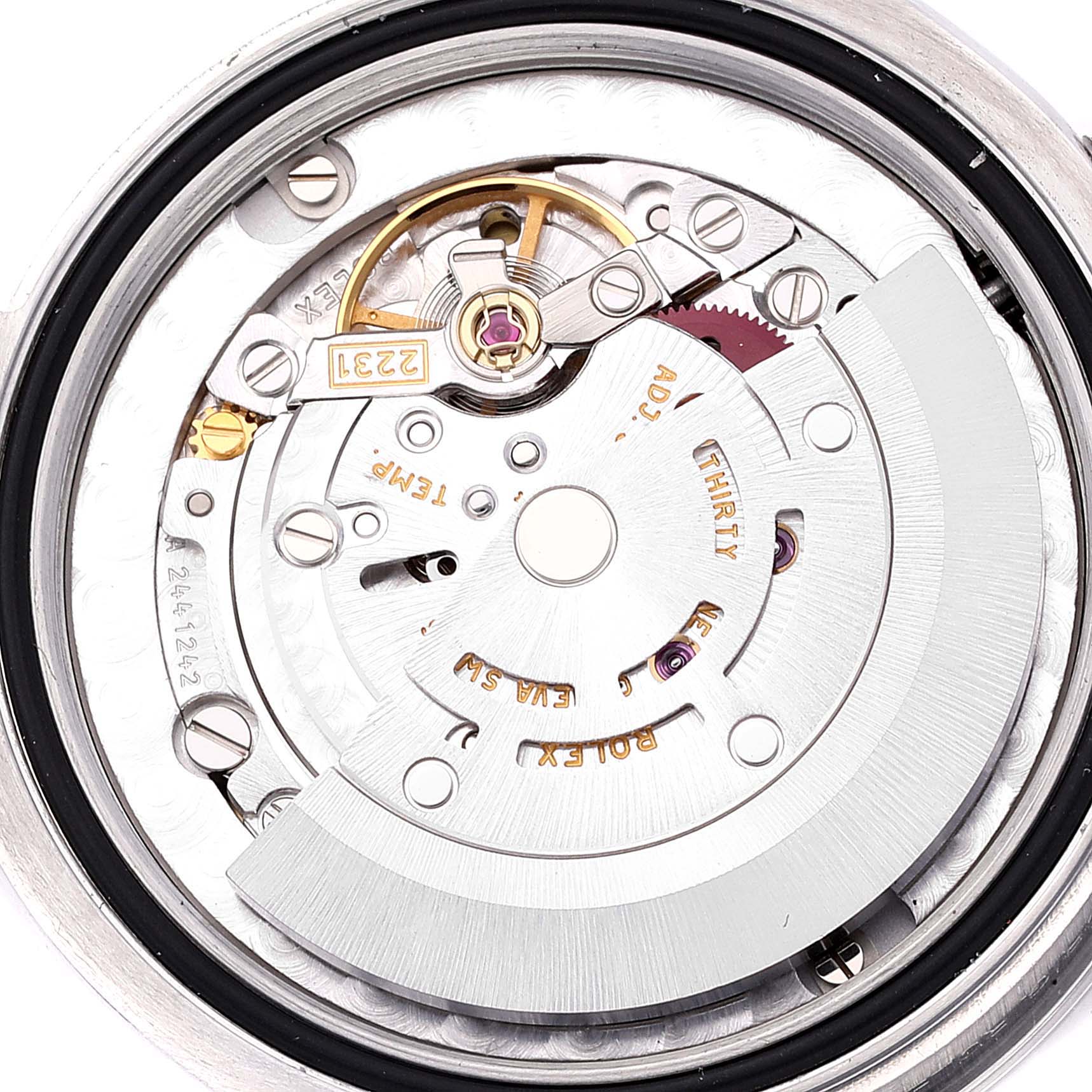 This image shows a close-up view of the internal movement parts of a Rolex Mid-Size 177200 Women
s Stainless Steel Blue Dial 177200 Women
s Stainless Steel Blue Dial model watch.