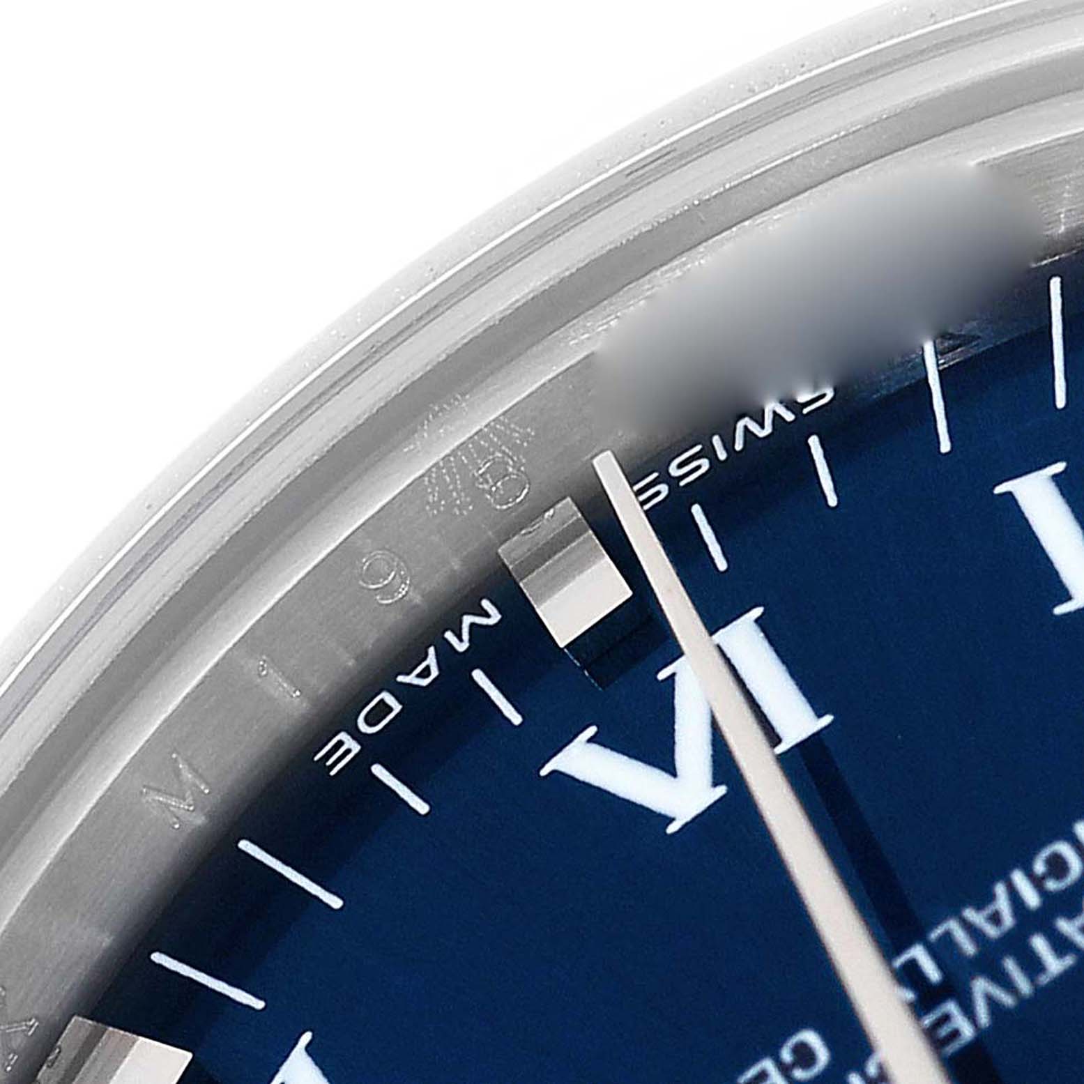 This is a close-up angle showing the dial and part of the bezel of the Rolex Mid-Size 177200 Women
s Stainless Steel Blue Dial 177200 Women
s Stainless Steel Blue Dial model watch.