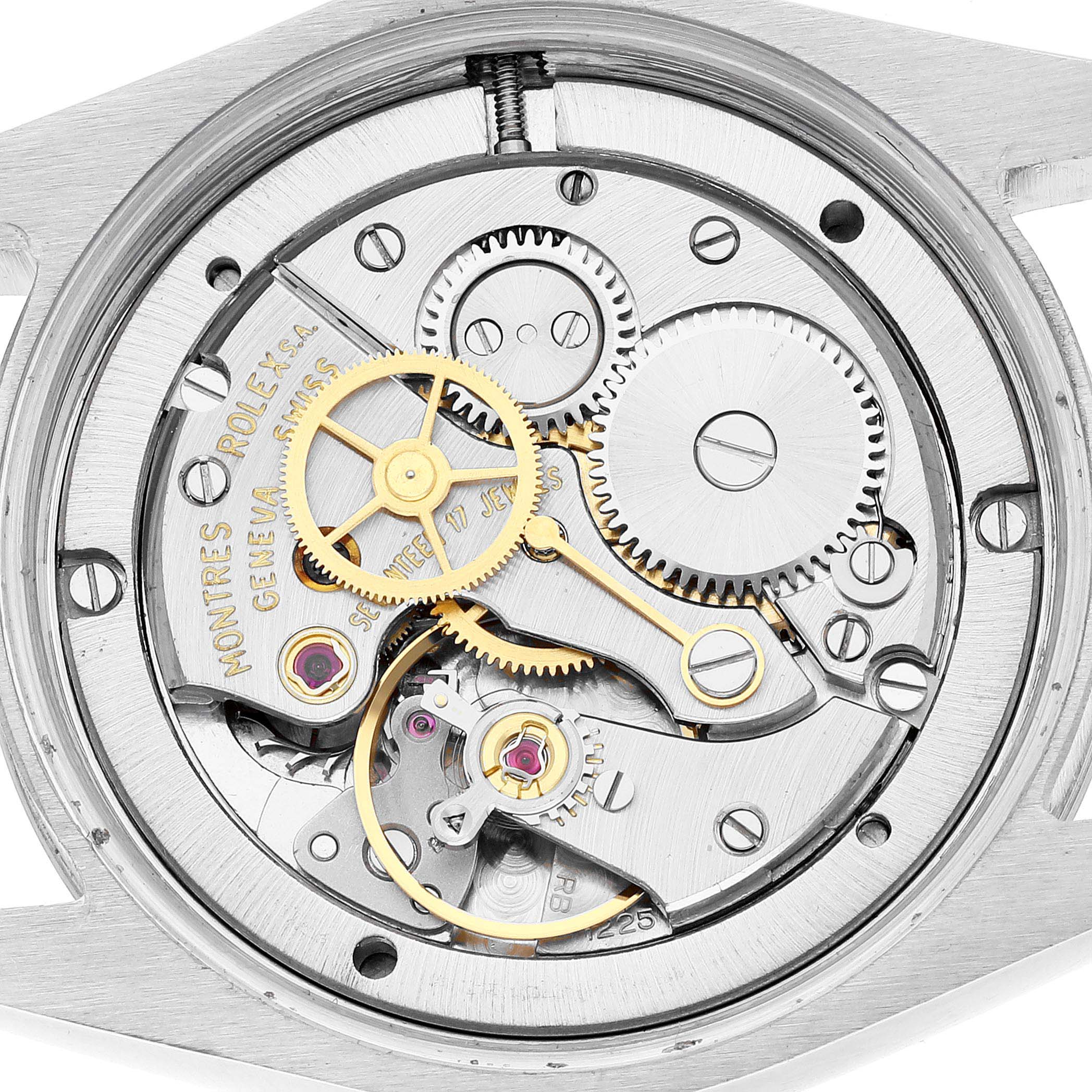 This image shows a close-up of the Rolex Vintage Collection 6694 Men's Stainless Steel Silver Dial 6694 Men's Stainless Steel Silver Dial watch movement, highlighting its intricate gears and components.