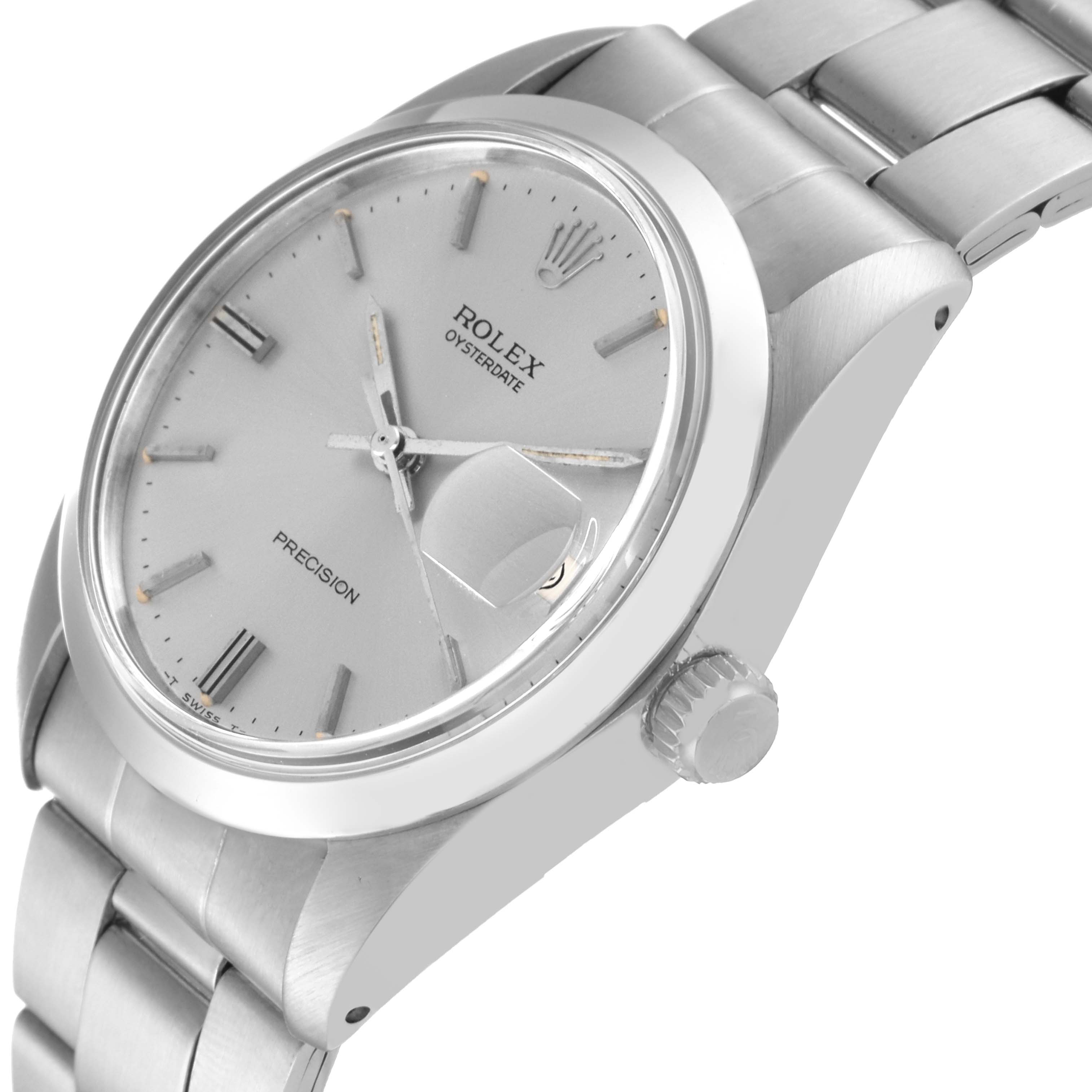 The image shows a Rolex Vintage Collection 6694 Men's Stainless Steel Silver Dial 6694 Men's Stainless Steel Silver Dial Oysterdate watch from an angled side view, highlighting the face, crown, and bracelet.