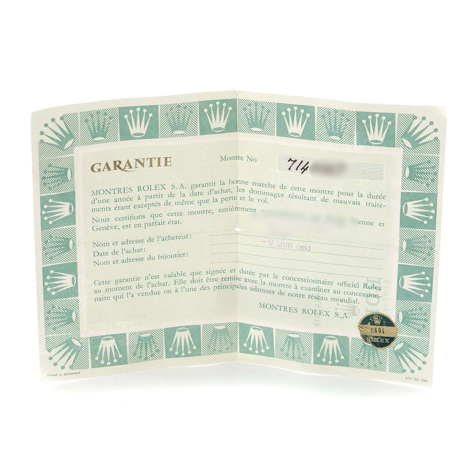 The image shows a Rolex Vintage Collection 6694 Men
s Stainless Steel Silver Dial 6694 Men
s Stainless Steel Silver Dial warranty card with decorative borders and details about purchase and guarantee.