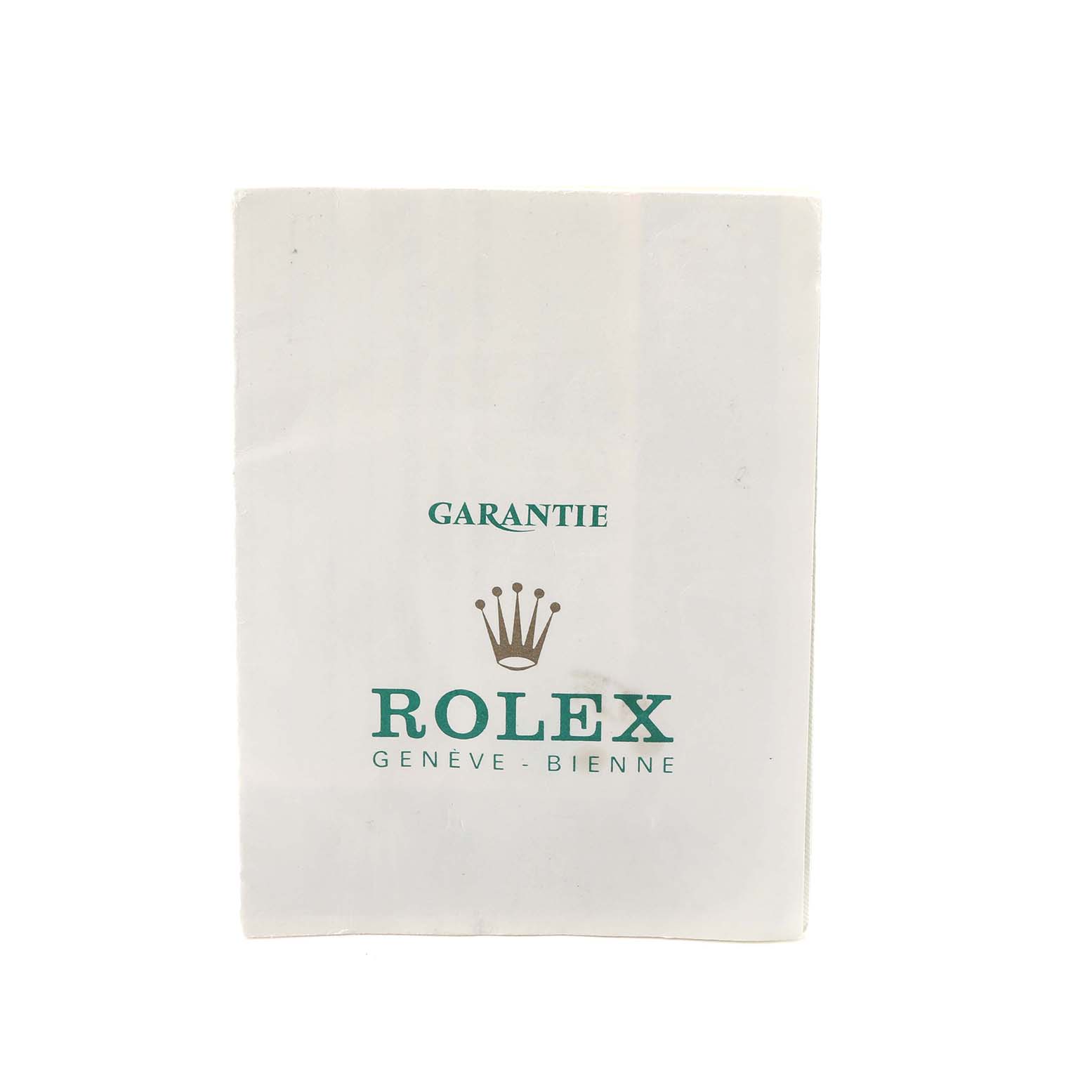 The image shows a warranty card for the Vintage Collection model by Rolex, featuring the logo and labeling.