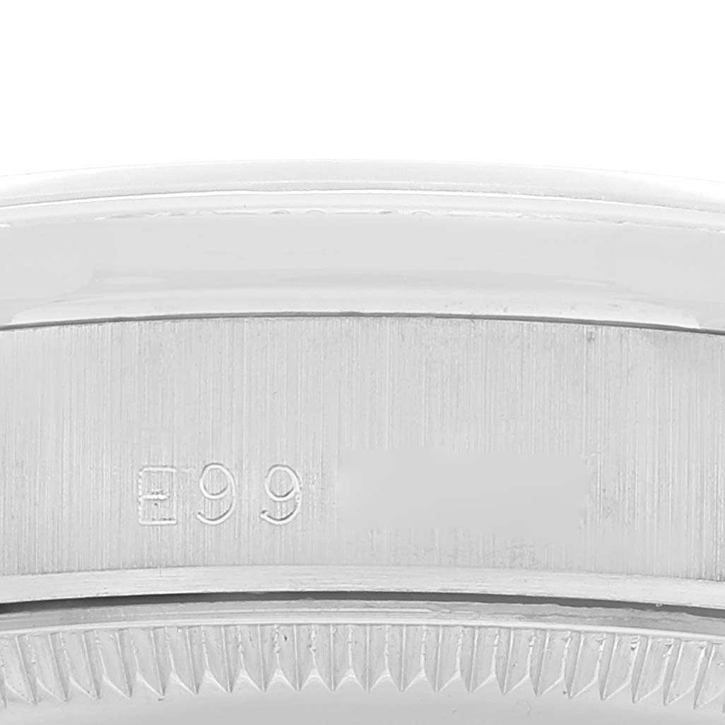 This image shows a close-up of the side of the bezel and engraved serial number of a Rolex President 68289 Women's White Gold Silver Dial 68289 Women's White Gold Silver Dial model watch.