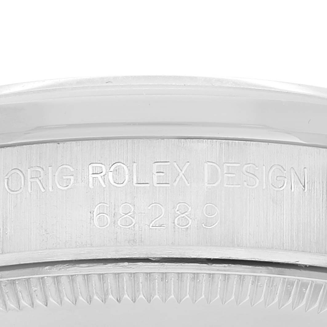 This close-up image shows the case back and serial number engraving of a Rolex President 68289 Women's White Gold Silver Dial 68289 Women's White Gold Silver Dial model watch.
