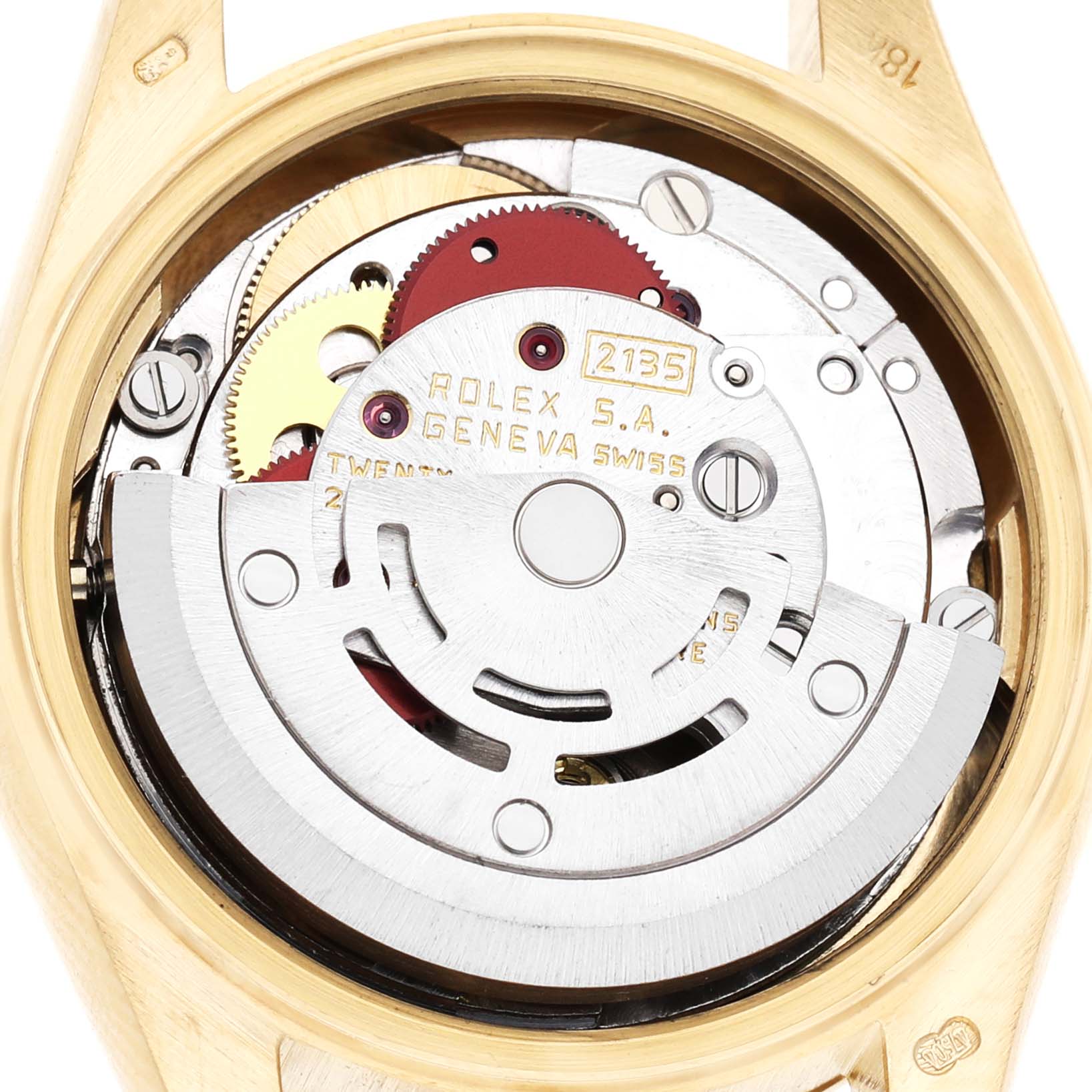 The image shows the intricate movement mechanism of a Rolex President 69178 Women's Yellow Gold White Dial watch from the back angle, with visible gears and rotor.
