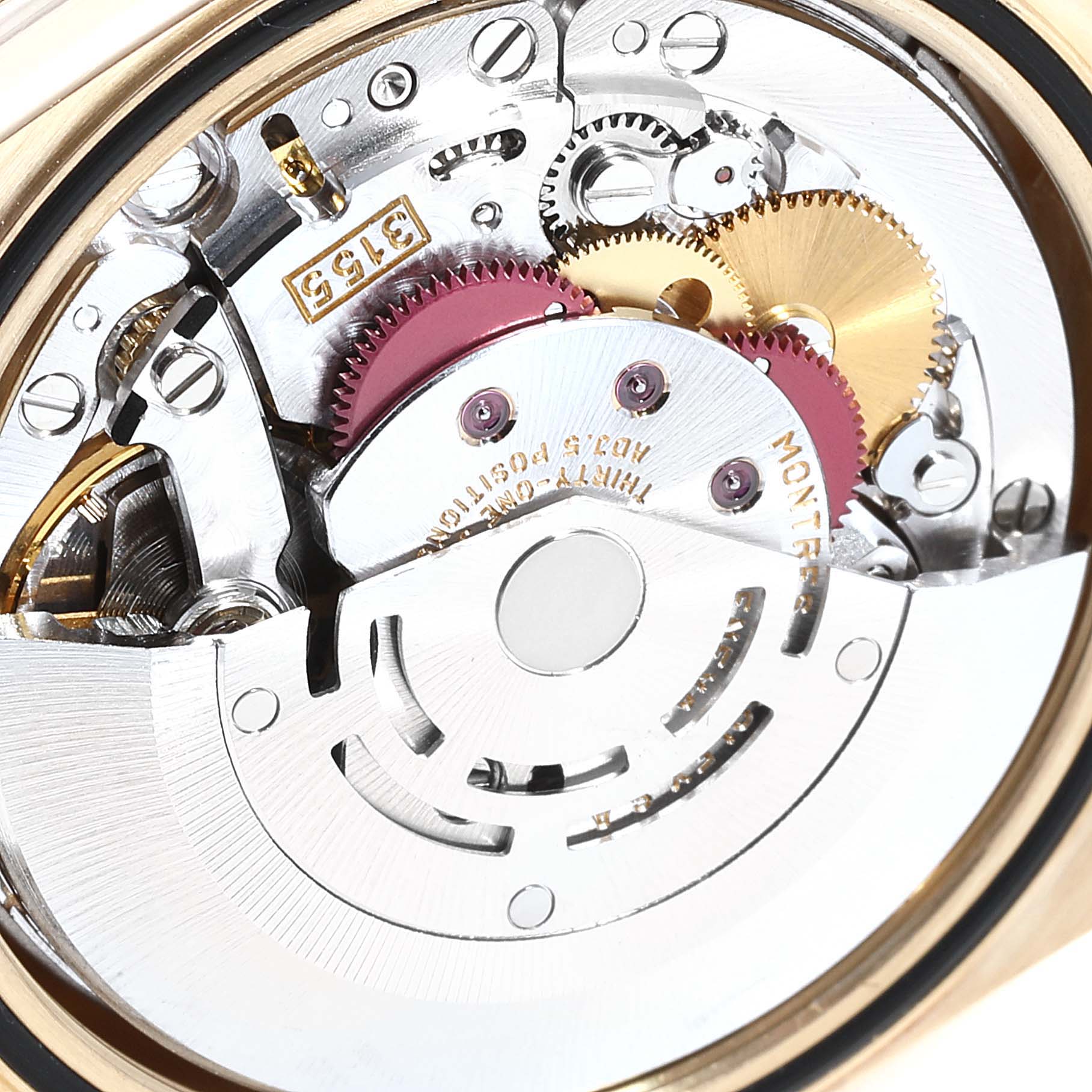 This image shows a close-up of the internal mechanical movement of a Rolex President 18308 Men
s Yellow Gold Champagne Dial 18308 Men
s Yellow Gold Champagne Dial model watch.