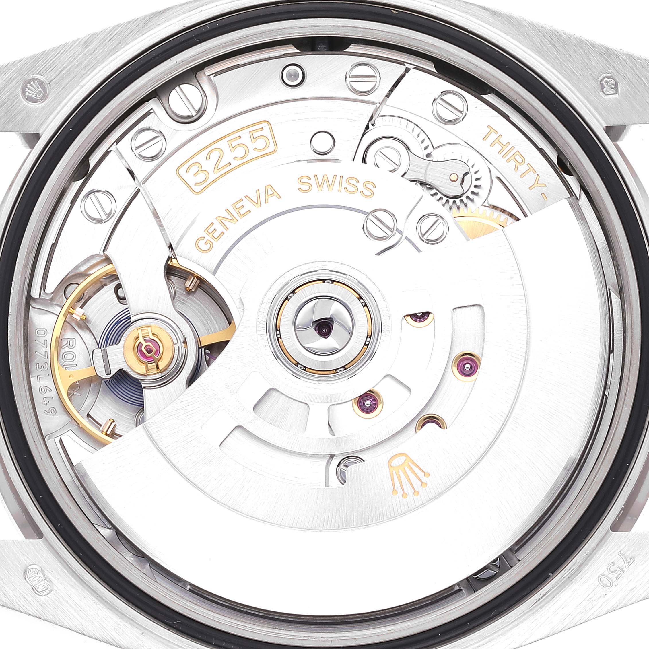 The image shows a close-up of the movement and internal mechanism of a Rolex President 128349RBR Men's White Gold White Dial 128349RBR Men's White Gold White Dial model watch.