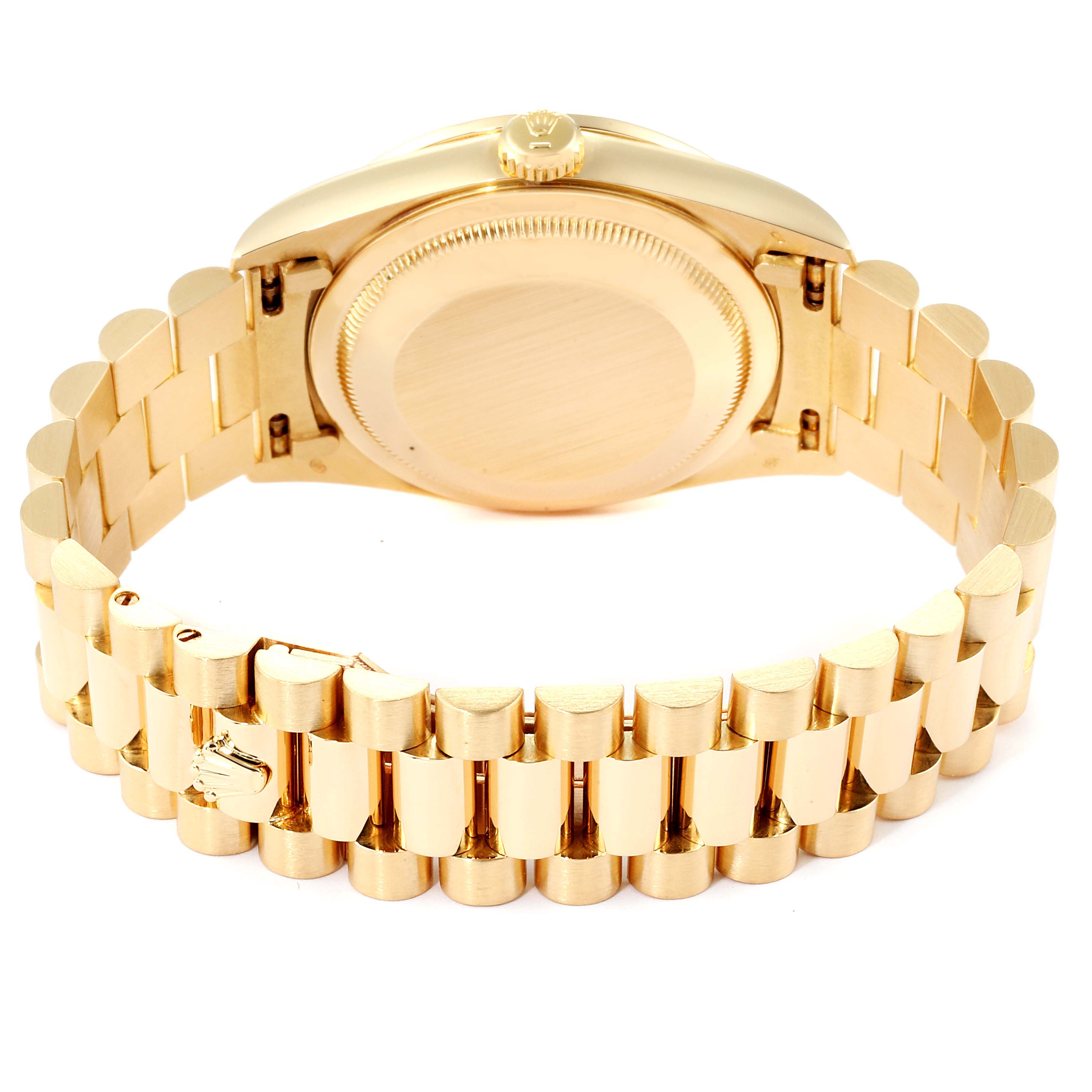 The image shows the back of the case and bracelet of a Rolex President 18238 Men
s Yellow Gold Champagne Dial 18238 Men
s Yellow Gold Champagne Dial model watch.