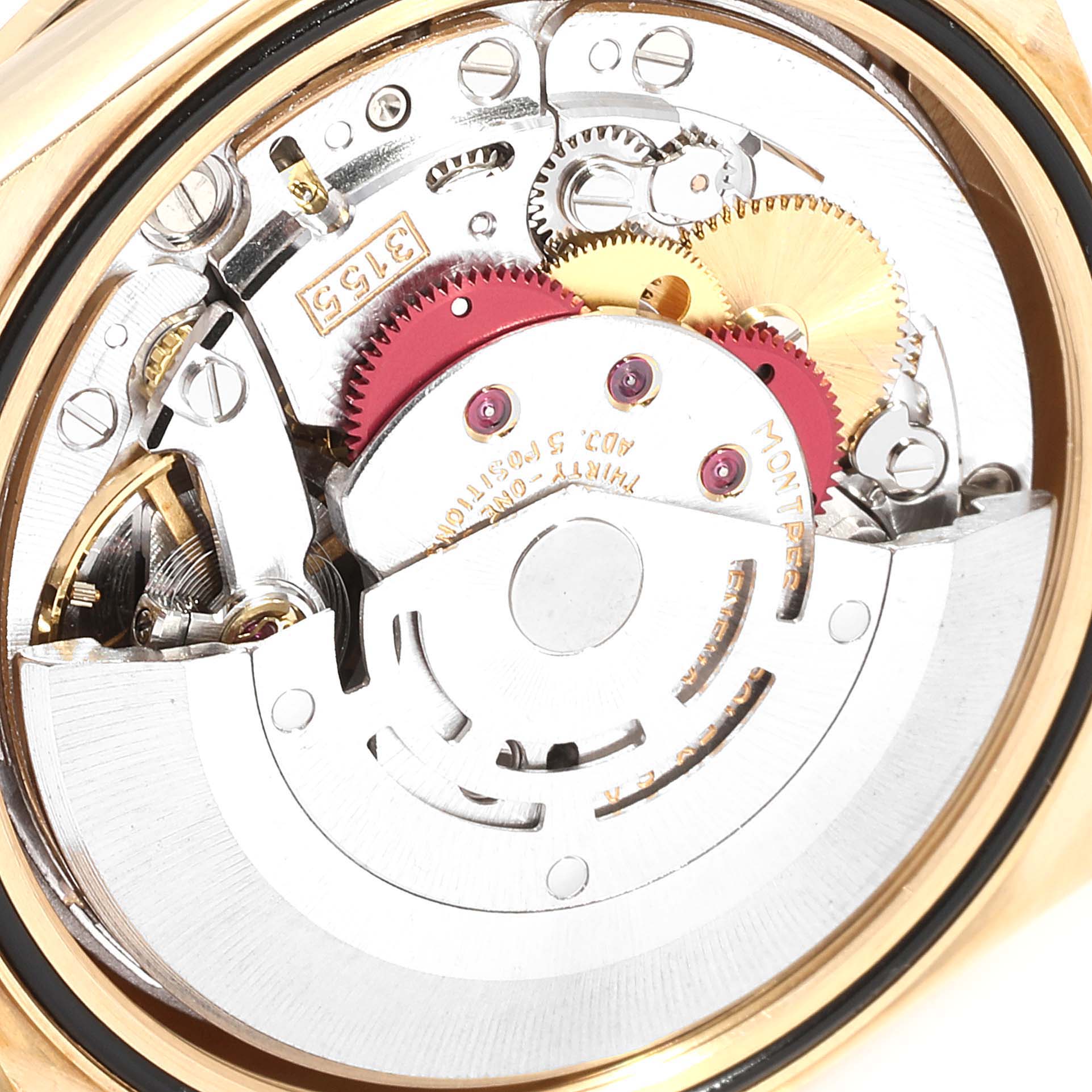This image shows a close-up of the internal mechanism of a Rolex President 18238 Men
s Yellow Gold Champagne Dial 18238 Men
s Yellow Gold Champagne Dial model watch, highlighting gears and components.