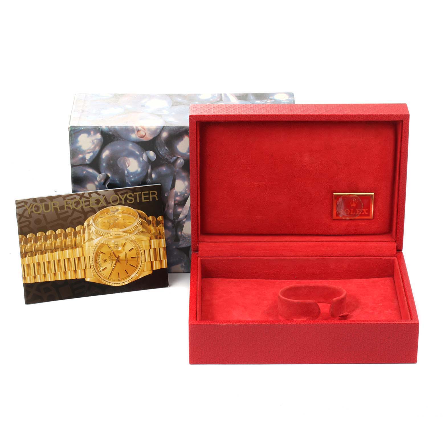 This image shows a Rolex President 69136 Women's Platinum Silver Dial 69136 Women's Platinum Silver Dial watch box, its outer box, and a Rolex booklet.