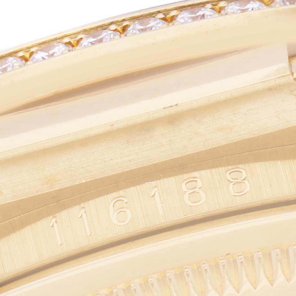 The image shows a side view of the Rolex President 116188 Men
s Yellow Gold Champagne Dial 116188 Men
s Yellow Gold Champagne Dial model focusing on the bezel with diamonds and the engraved reference number.