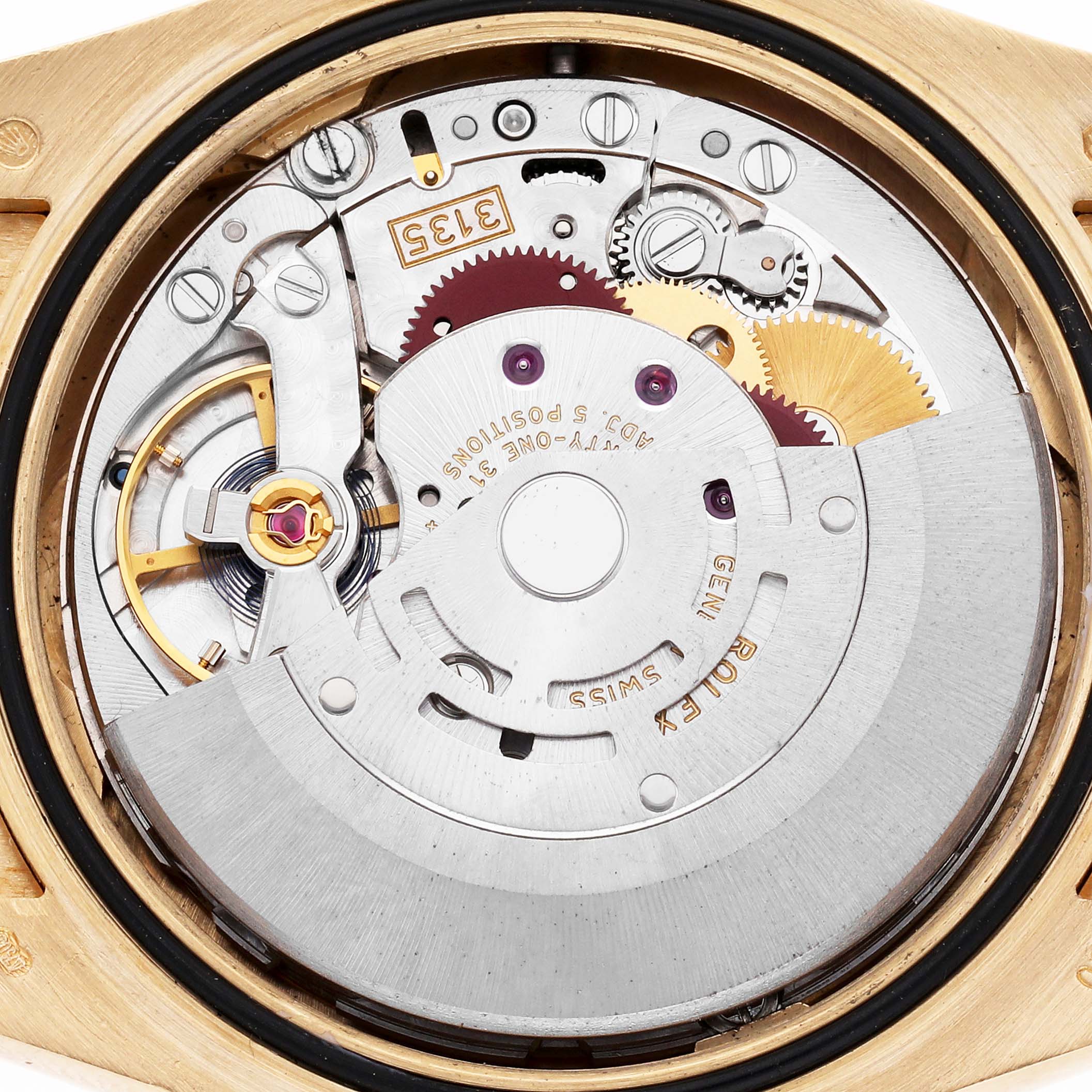The image shows the movement mechanism of a Rolex President 116188 Men
s Yellow Gold Champagne Dial 116188 Men
s Yellow Gold Champagne Dial watch from the back, highlighting gears and components.
