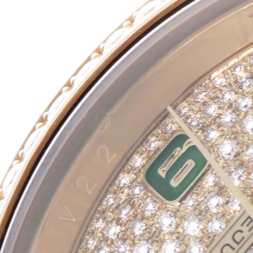 The image shows a close-up of the Rolex President 116188 Men
s Yellow Gold Champagne Dial 116188 Men
s Yellow Gold Champagne Dial watch face, highlighting its diamond-set dial and part of the bezel.