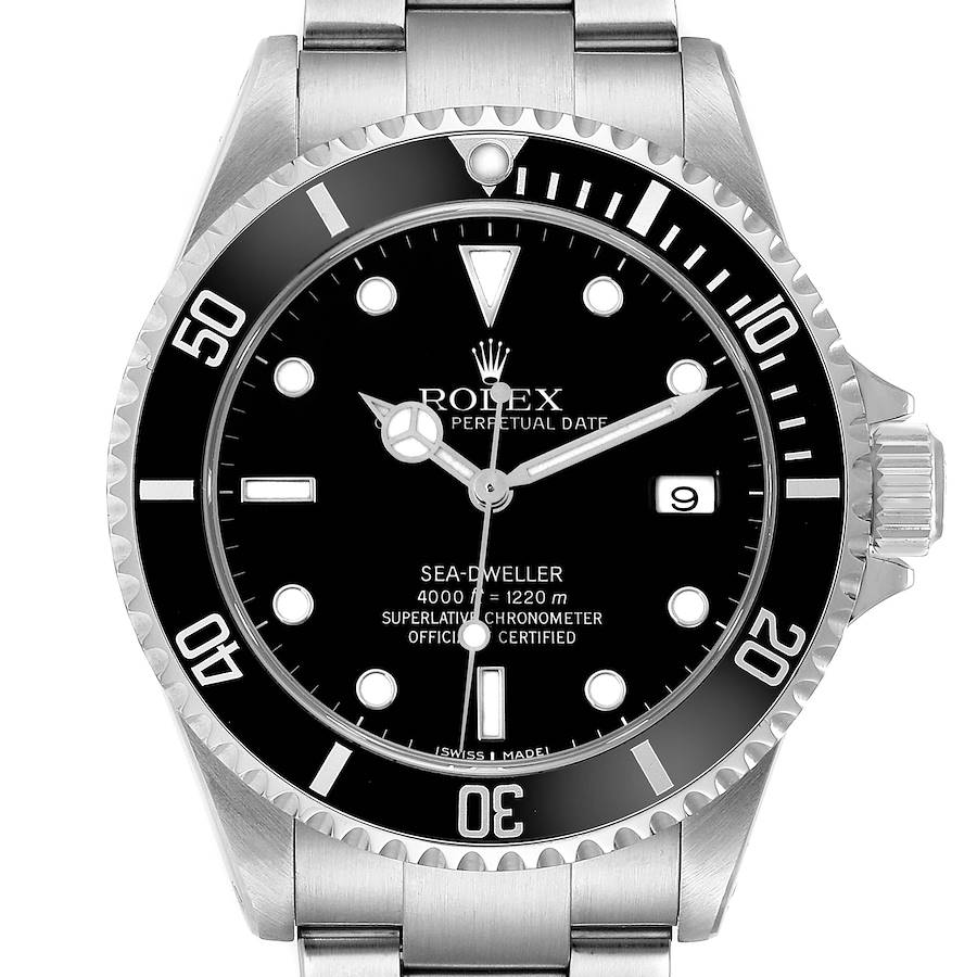 The image shows a front view of the Rolex Sea-Dweller, highlighting the dial, bezel, crown, and bracelet.