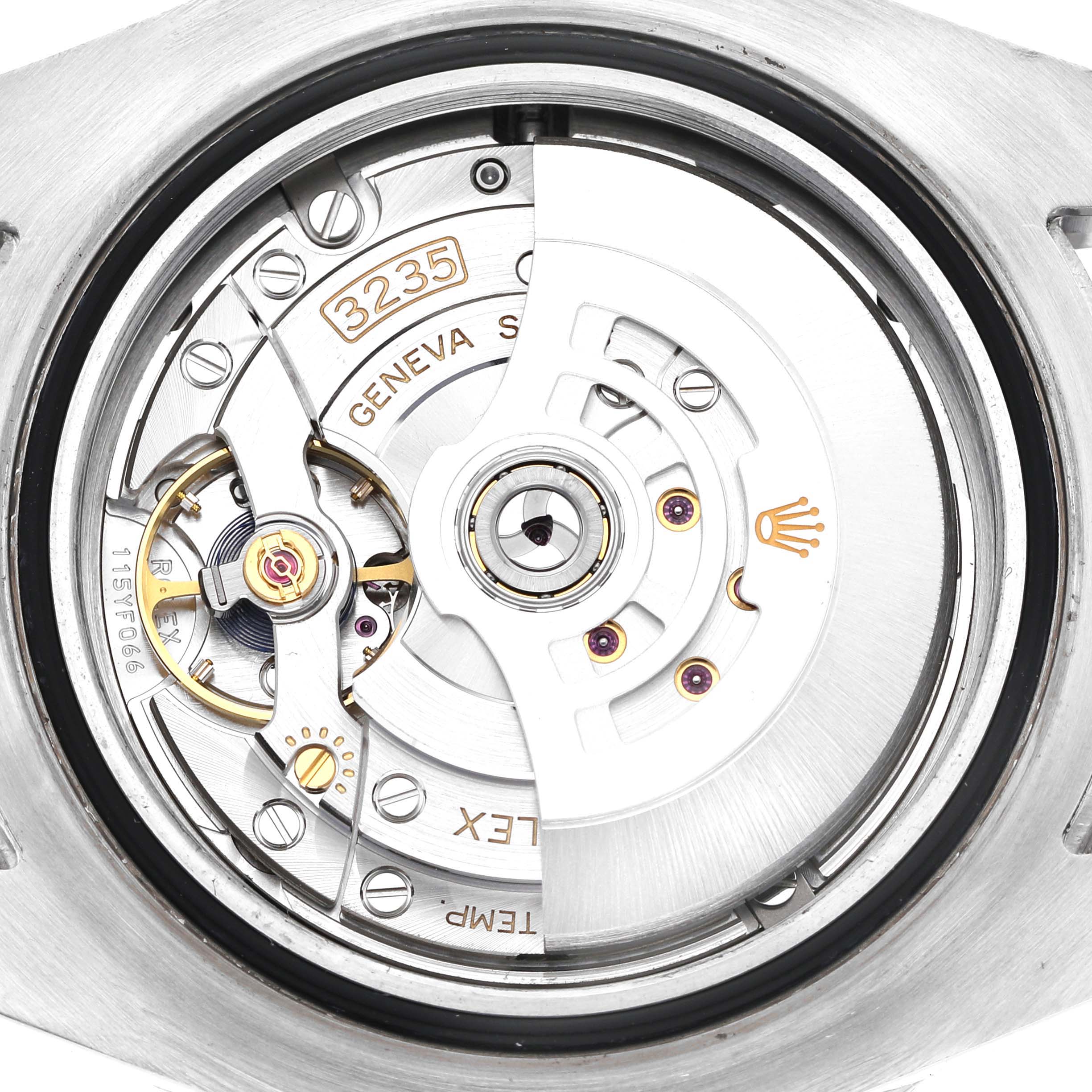 The image shows the movement of a Rolex Sea-Dweller 126600 Men's Stainless Steel Black Dial watch viewed from the back, highlighting the rotor and internal mechanics.