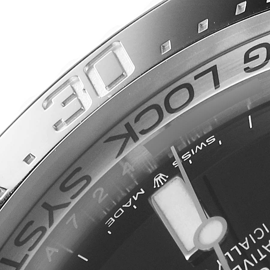 This image shows a close-up angle of the bezel and part of the dial of a Rolex Sea-Dweller 126660 Men
s Stainless Steel Blue Dial 126660 Men
s Stainless Steel Blue Dial watch, focusing on the "30" marking and text.