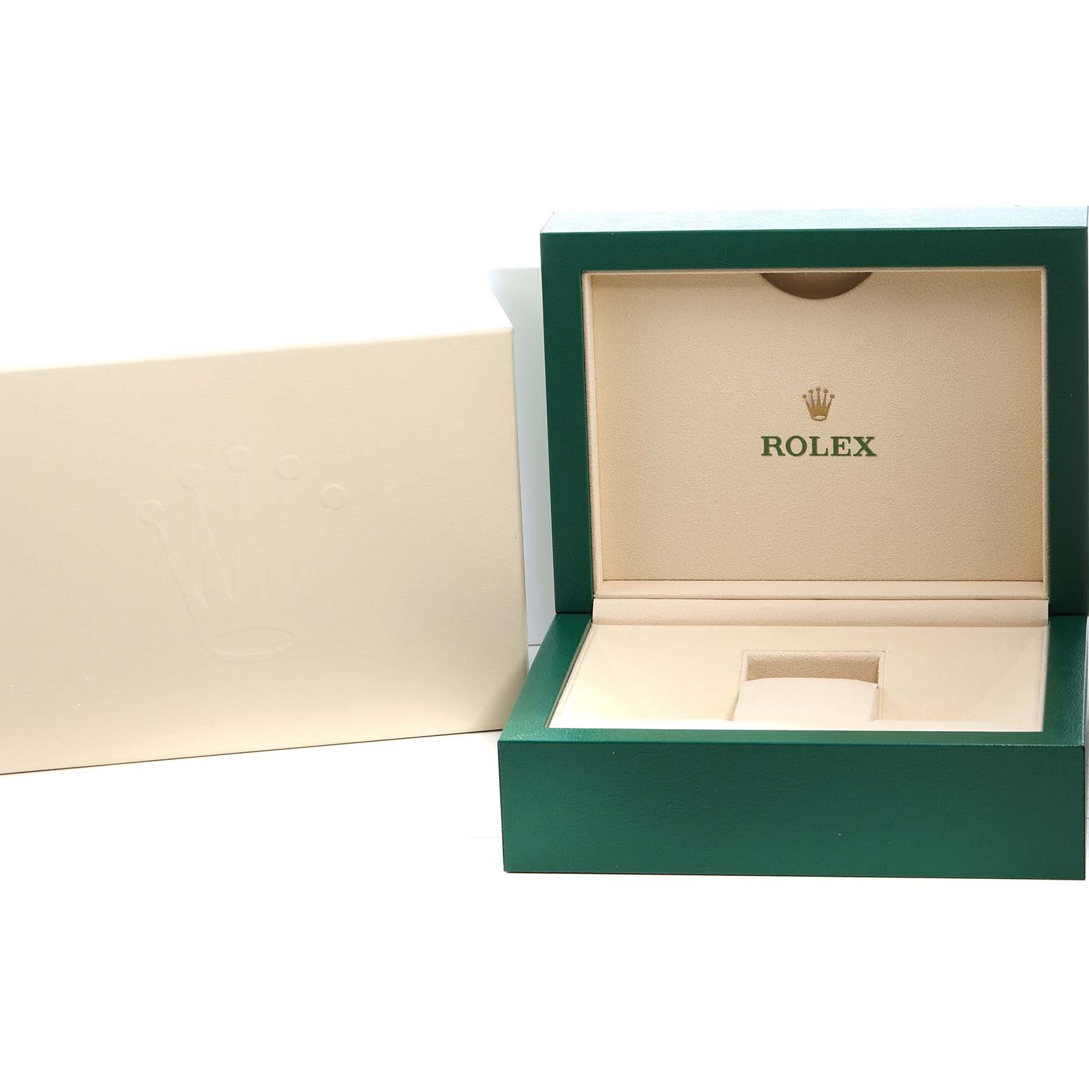 The image shows an open green Rolex box for the Sea-Dweller model, with a cream interior and the Rolex logo on the lid.