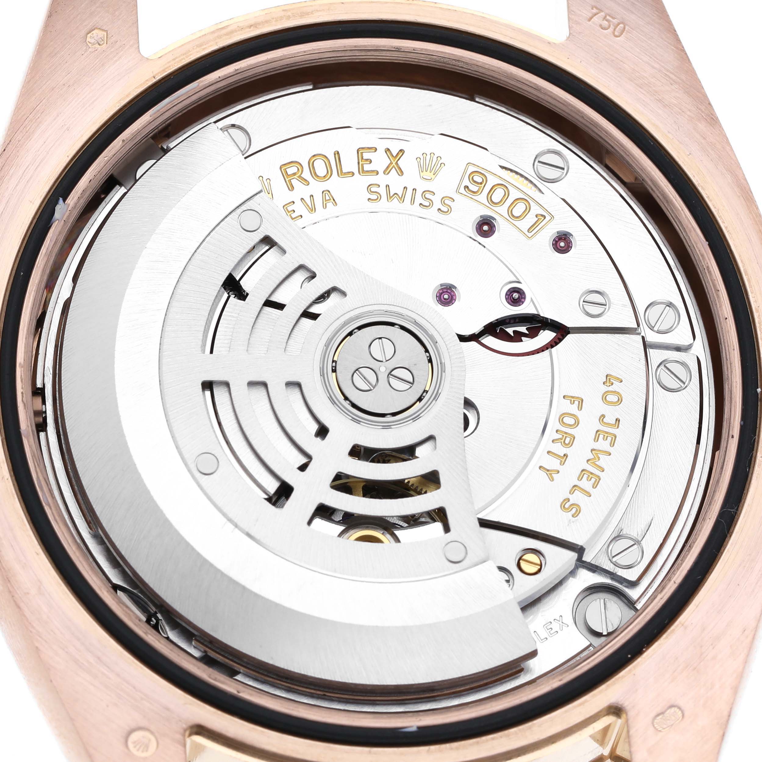 The image shows the movement mechanism of a Rolex Sky-Dweller 326935 Men's Rose Gold Pink Dial, focusing on the rotor and internal components.