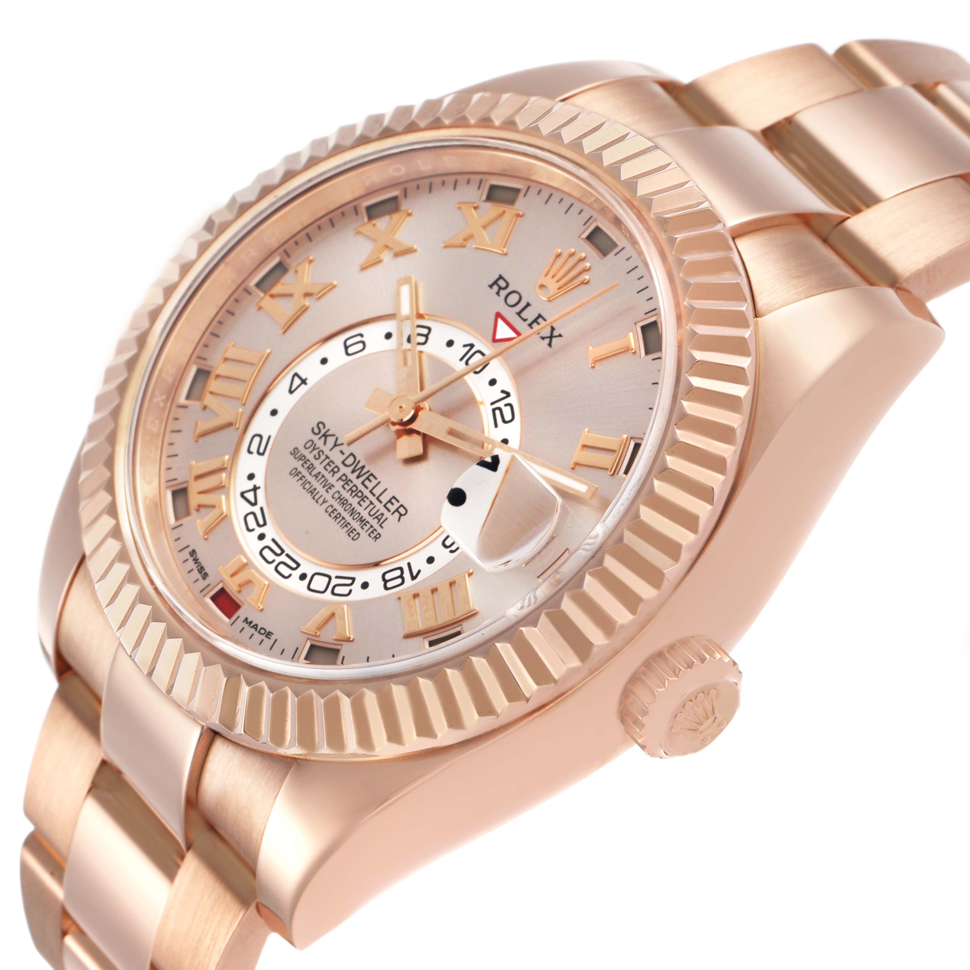 The Rolex Sky-Dweller 326935 Men's Rose Gold Pink Dial is angled to show its face, bezel, crown, and part of the bracelet, emphasizing the detailed dial.
