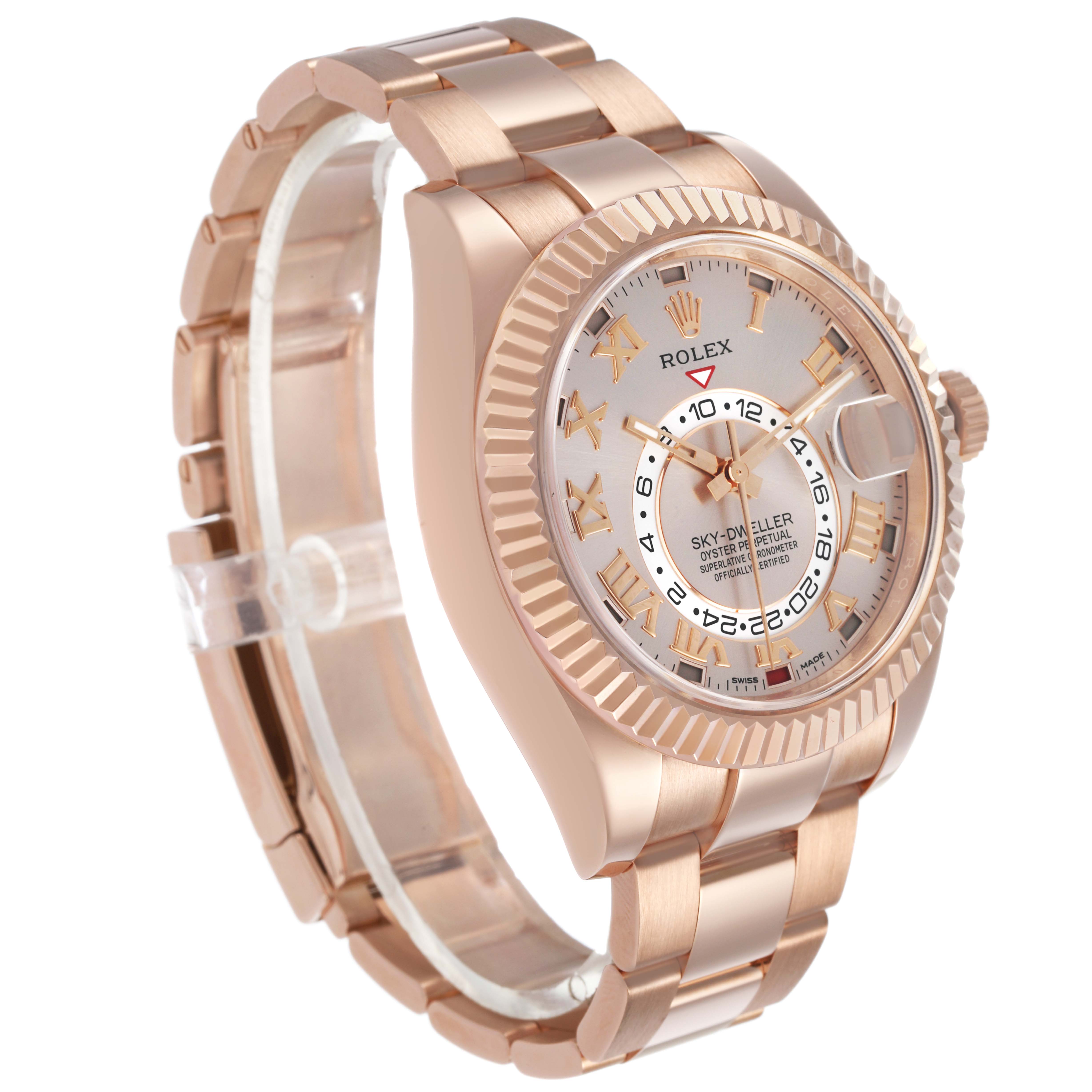 The Rolex Sky-Dweller 326935 Men's Rose Gold Pink Dial watch is shown at a three-quarter angle, highlighting the bezel, dial, bracelet, and crown.