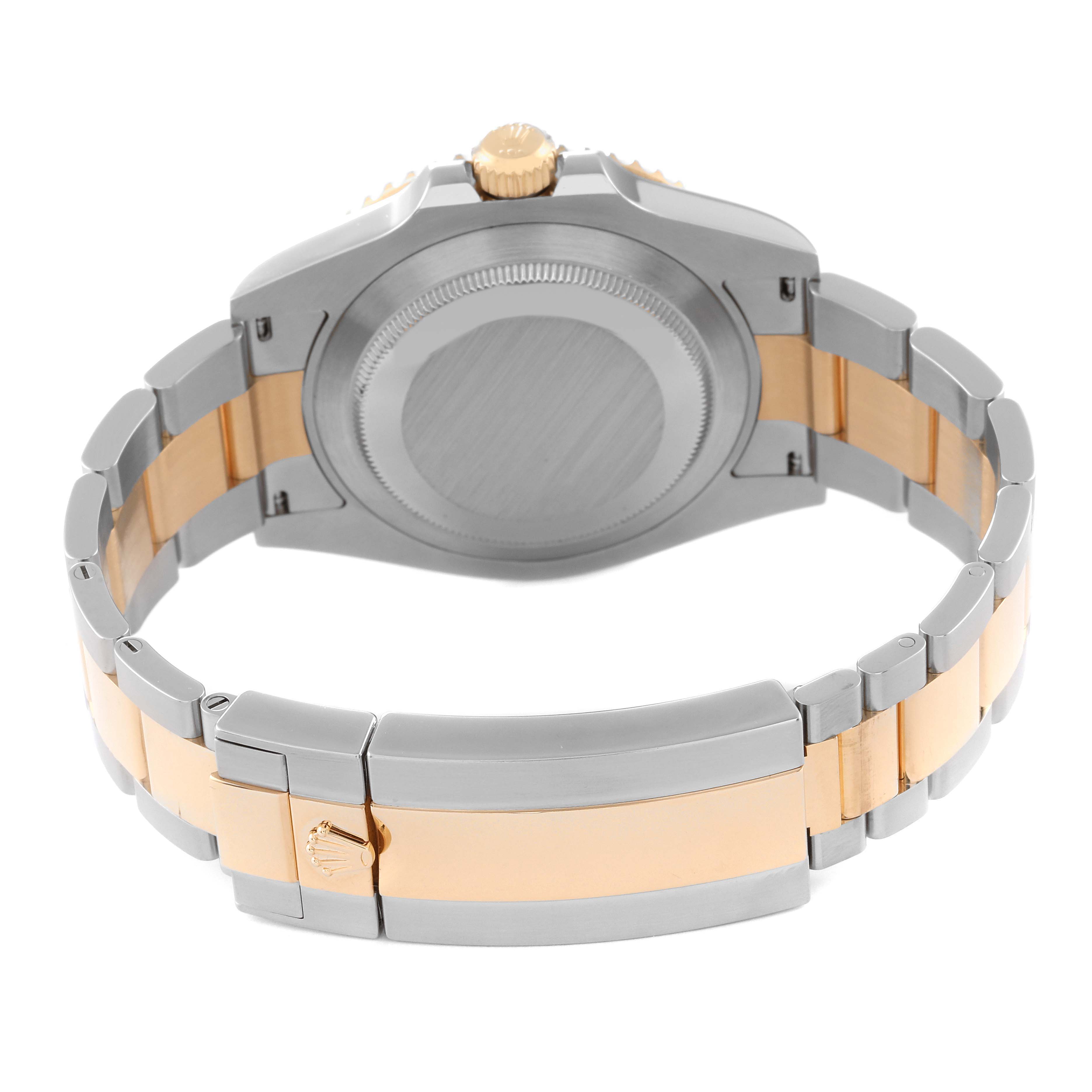 This image shows the back view of a Rolex Submariner 126613 Men
s Steel and Gold (two tone) Blue Dial 126613 Men
s Steel and Gold (two tone) Blue Dial watch, highlighting the case back and two-tone bracelet.