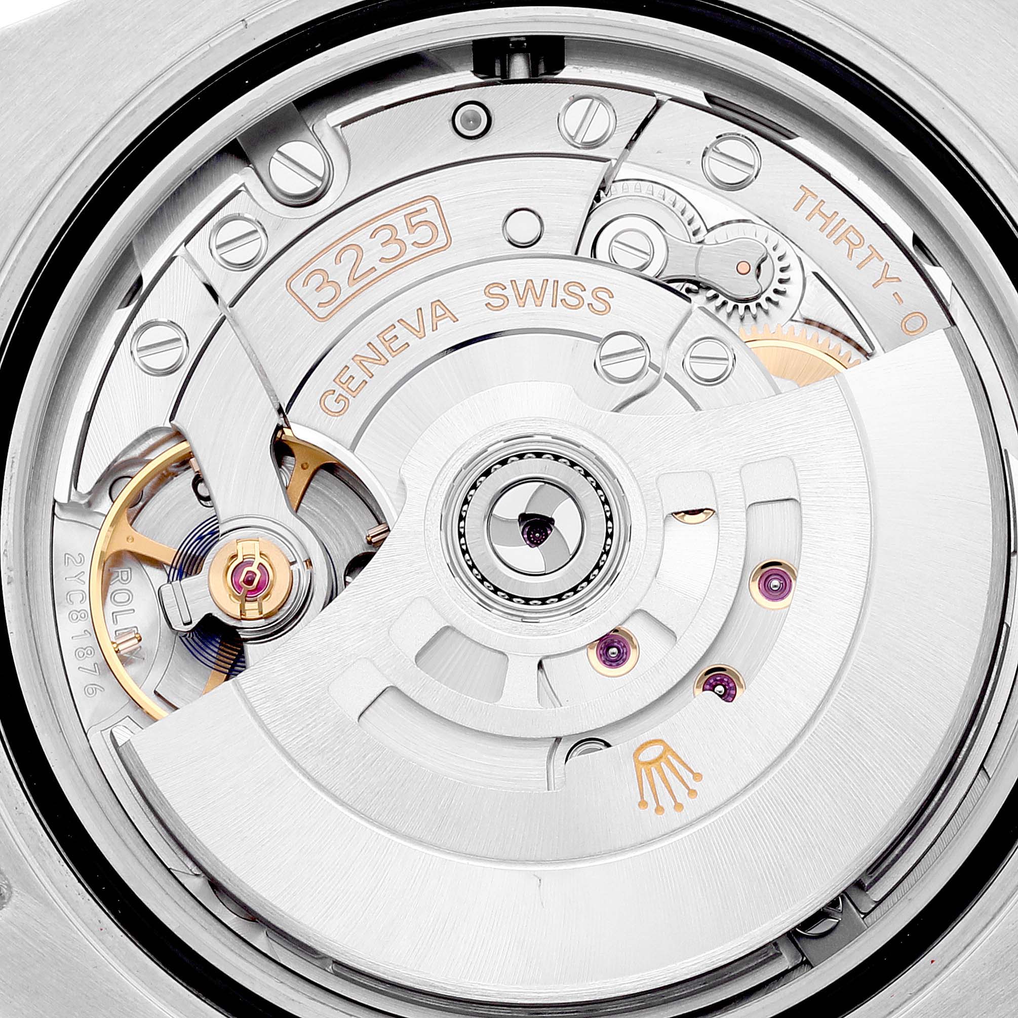 This is an image of the Rolex Submariner 126613 Men
s Steel and Gold (two tone) Blue Dial 126613 Men
s Steel and Gold (two tone) Blue Dial
s 3235 movement, showing intricate internal components and mechanics.