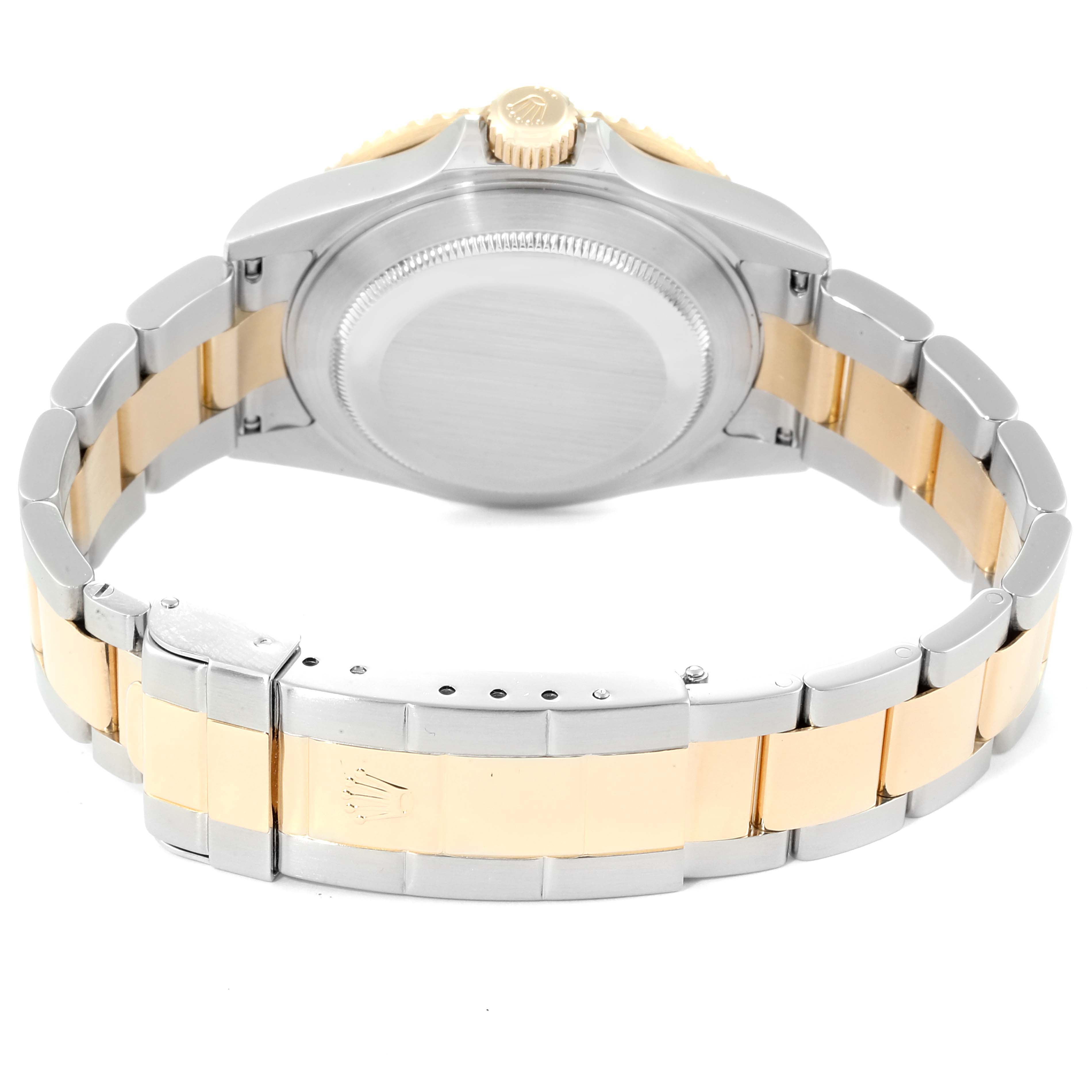 This image shows the back view of a Rolex Submariner 16613 Men
s Steel and Gold (two tone) Blue Dial 16613 Men
s Steel and Gold (two tone) Blue Dial watch, highlighting its gold and silver bracelet, clasp, and crown.