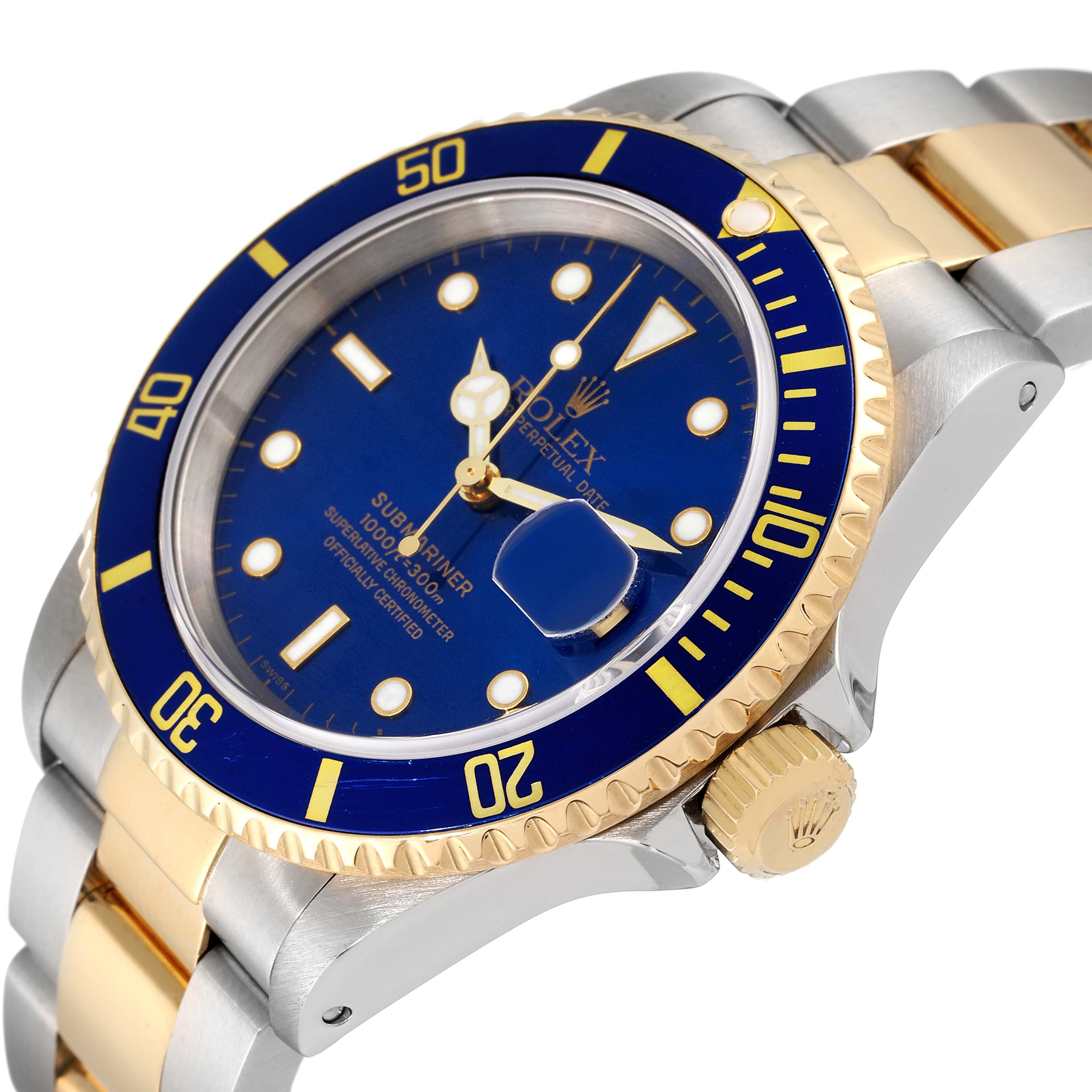 The image shows a close-up view of a Rolex Submariner 16613 Men
s Steel and Gold (two tone) Blue Dial 16613 Men
s Steel and Gold (two tone) Blue Dial watch, highlighting the blue dial, bezel, crown, and two-tone bracelet.