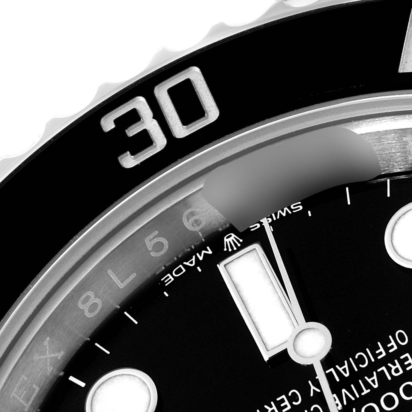 This close-up image of the Rolex Submariner 126610 Men
s Stainless Steel Black Dial 126610 Men
s Stainless Steel Black Dial shows the bezel, part of the dial, hour marker, and minute hand.