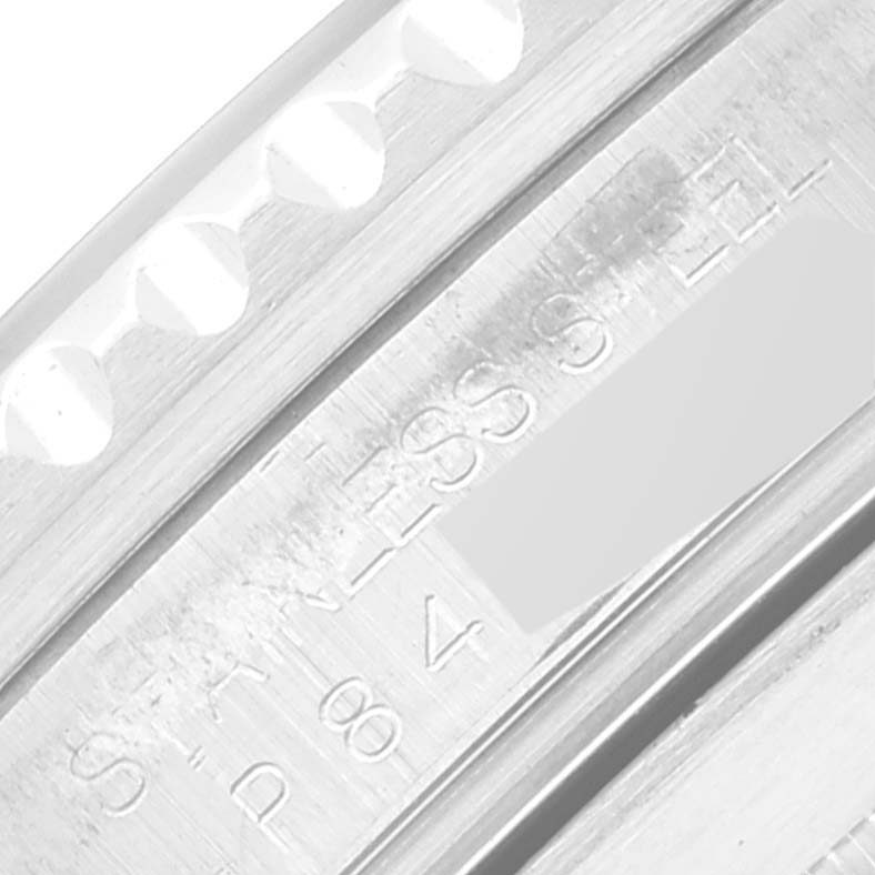 The image shows a close-up angle of the inner bezel with engravings of a Rolex Submariner 16610 Men
s Stainless Steel Black Dial 16610 Men
s Stainless Steel Black Dial watch.