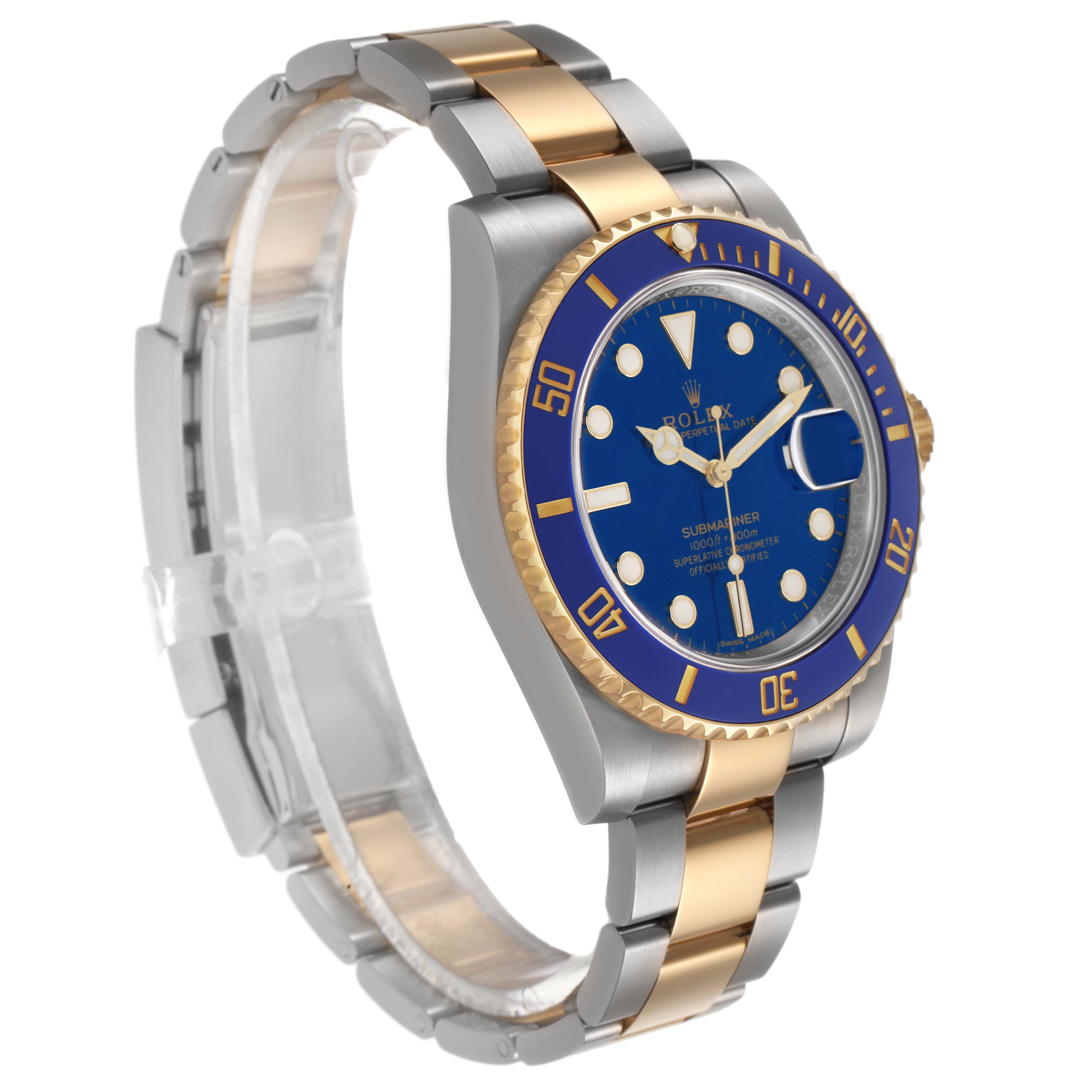 The Rolex Submariner 116613 Men's Steel and Gold (two tone) Blue Dial watch is shown at a three-quarter angle, highlighting the blue dial, bezel, and two-tone bracelet.