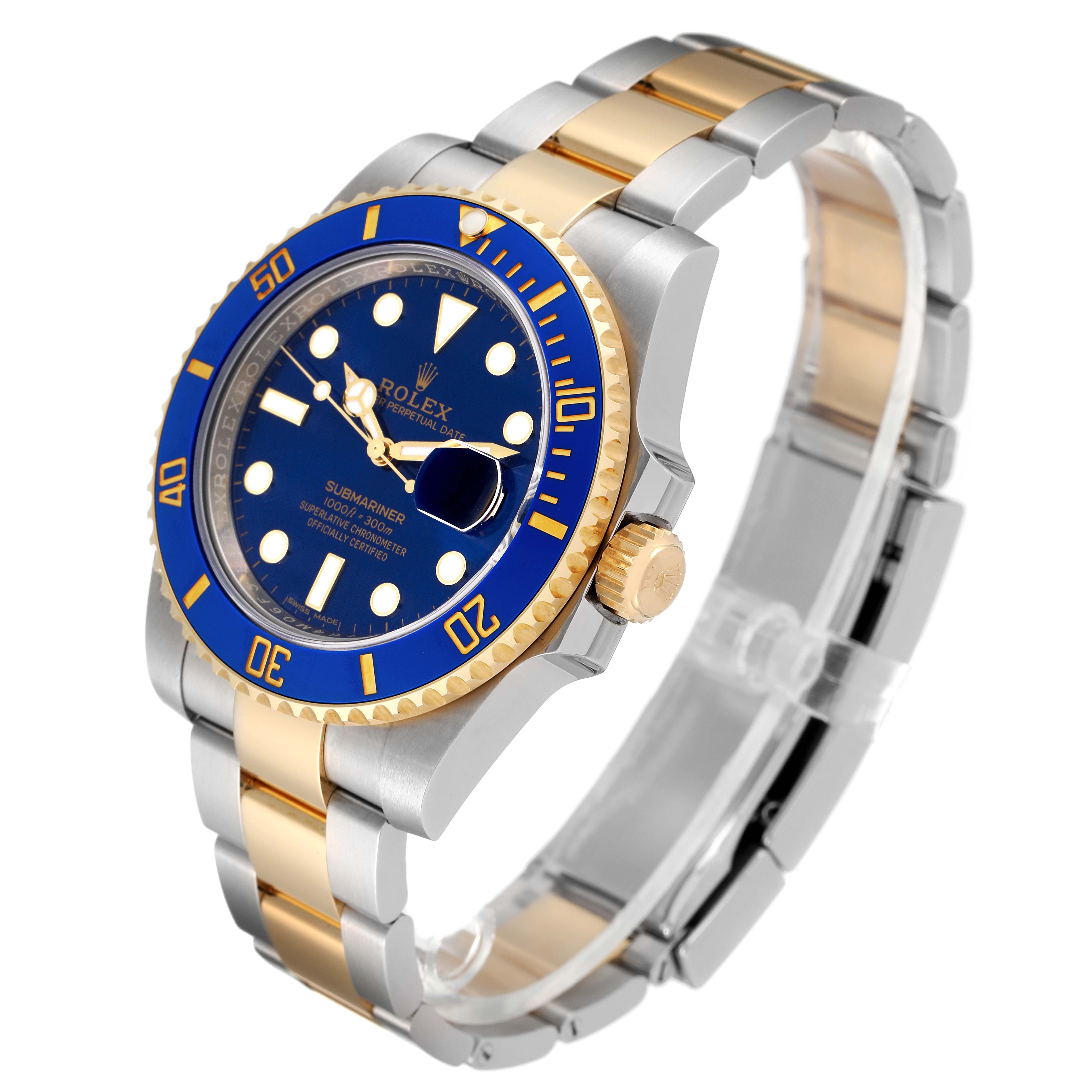 This image shows a Rolex Submariner 116613 Men
s Steel and Gold (two tone) Blue Dial 116613 Men
s Steel and Gold (two tone) Blue Dial watch at a three-quarter angle, highlighting the blue dial, bezel, and two-tone bracelet.