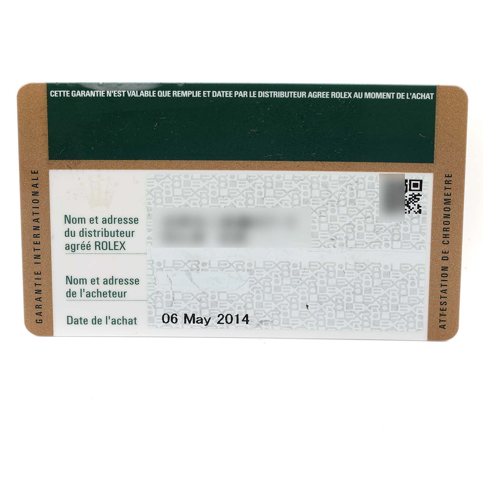 This image shows the warranty card for a Rolex Submariner 116613 Men
s Steel and Gold (two tone) Blue Dial 116613 Men
s Steel and Gold (two tone) Blue Dial watch, detailing the purchase date and distributor information.