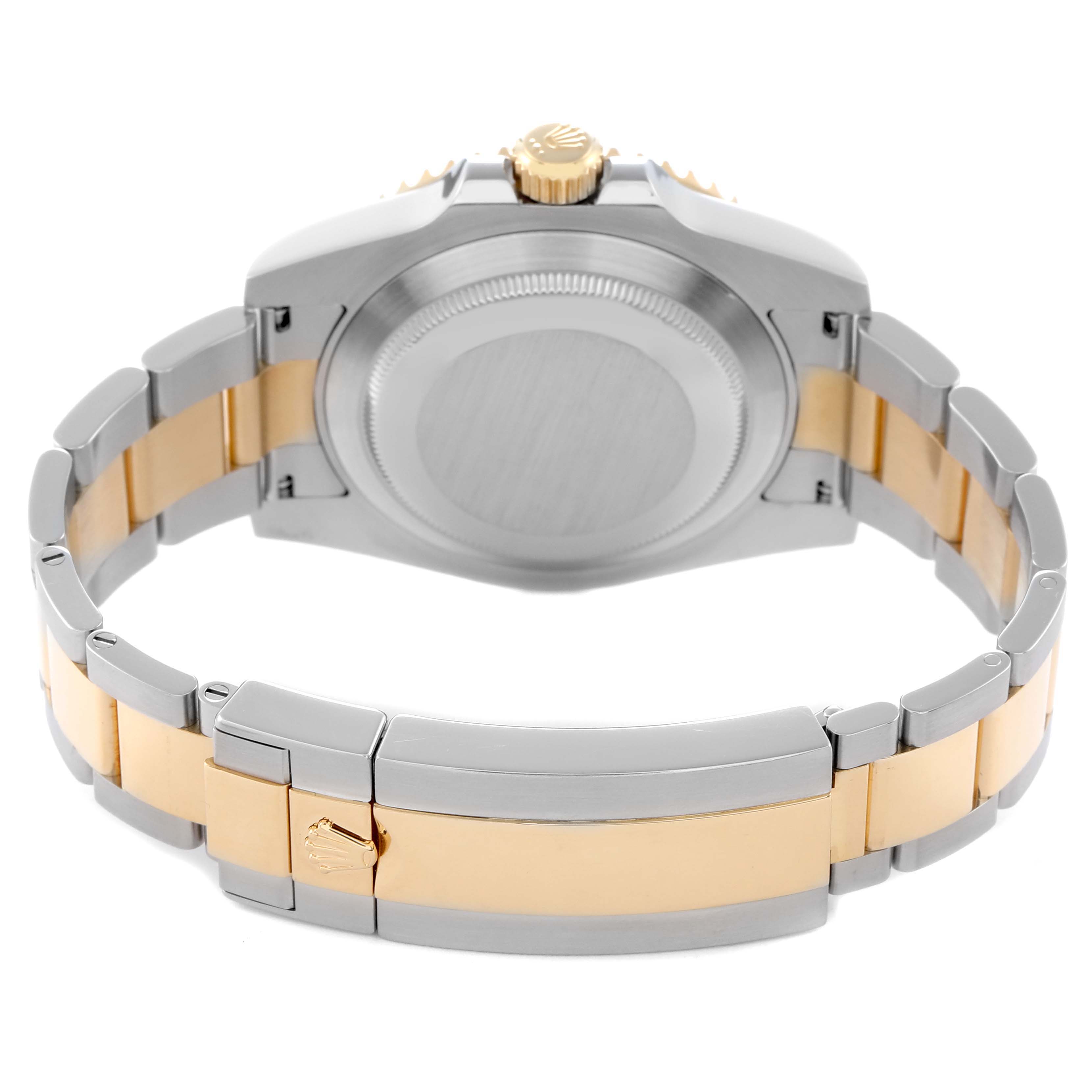 The image shows the back case and bracelet of a Rolex Submariner 116613 Men's Steel and Gold (two tone) Blue Dial 116613 Men's Steel and Gold (two tone) Blue Dial, highlighting the gold and stainless steel oyster-style bracelet.