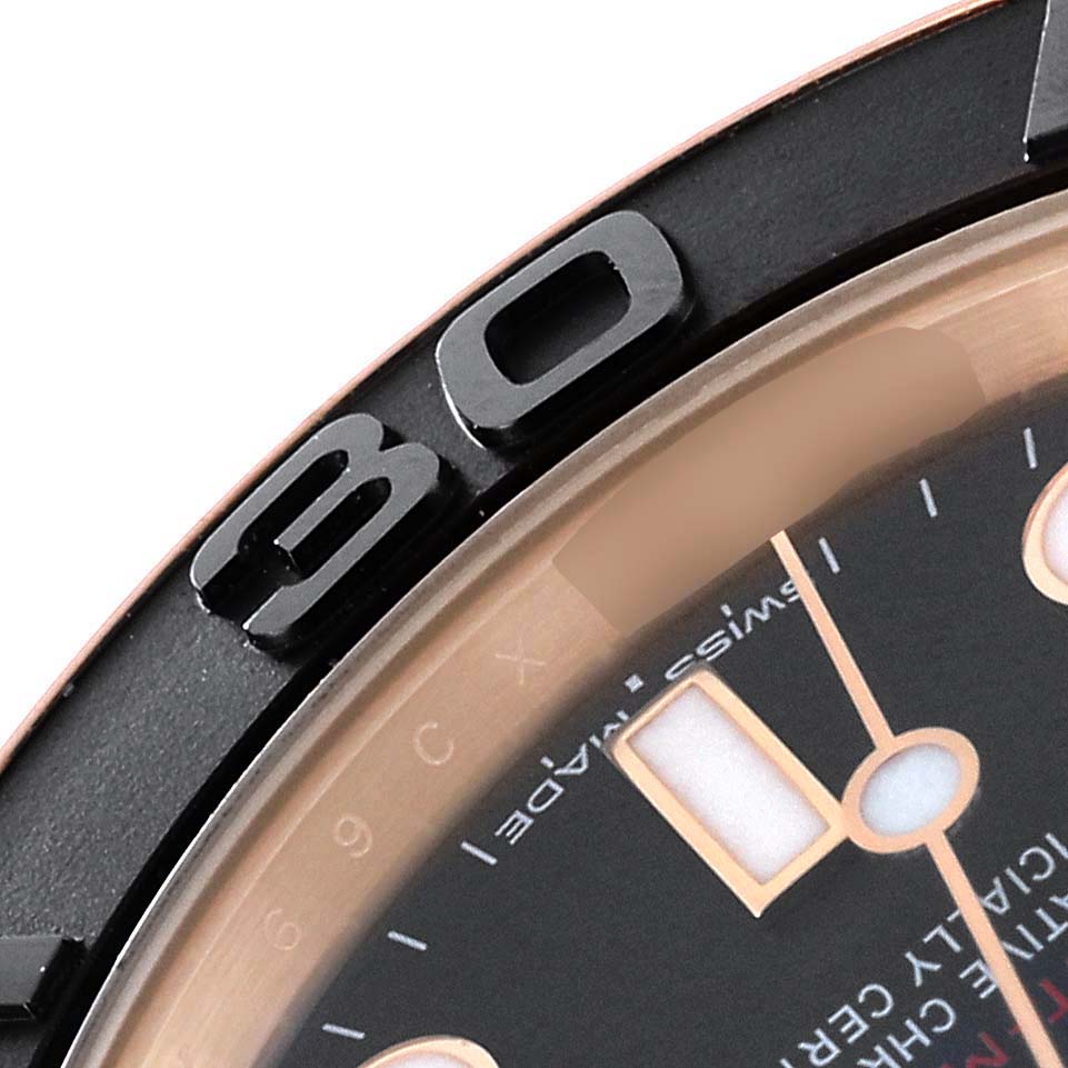 Close-up view of the bezel and part of the dial of a Rolex Yacht-Master 268655 Men's Rose Gold Black Dial 268655 Men's Rose Gold Black Dial watch.