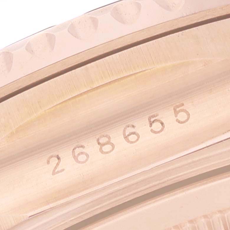 This close-up image shows the serial number inscribed on the bezel of a Rolex Yacht-Master 268655 Men's Rose Gold Black Dial 268655 Men's Rose Gold Black Dial watch.