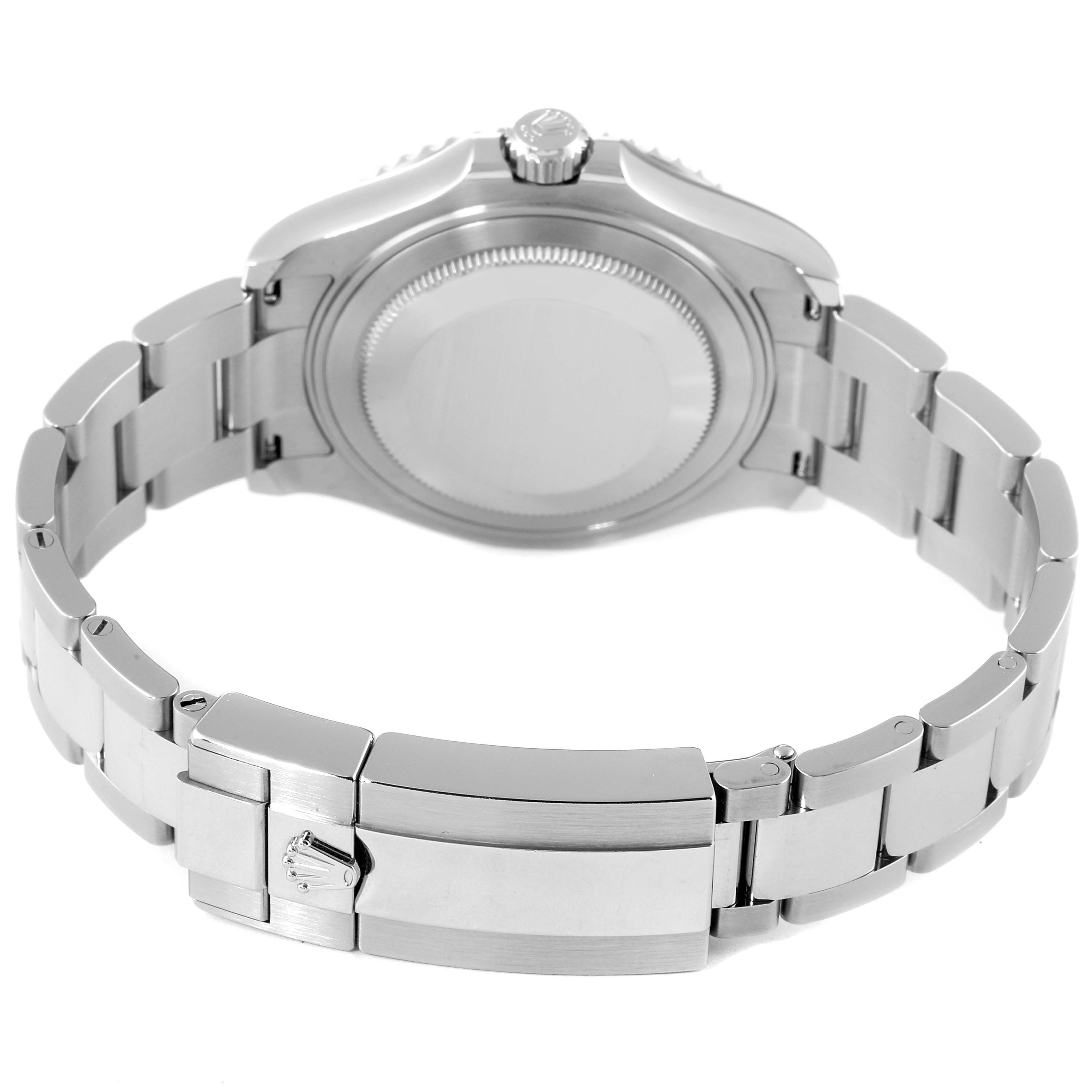 The image shows the back view of the Yacht-Master by Rolex, focusing on the bracelet, clasp, and caseback.