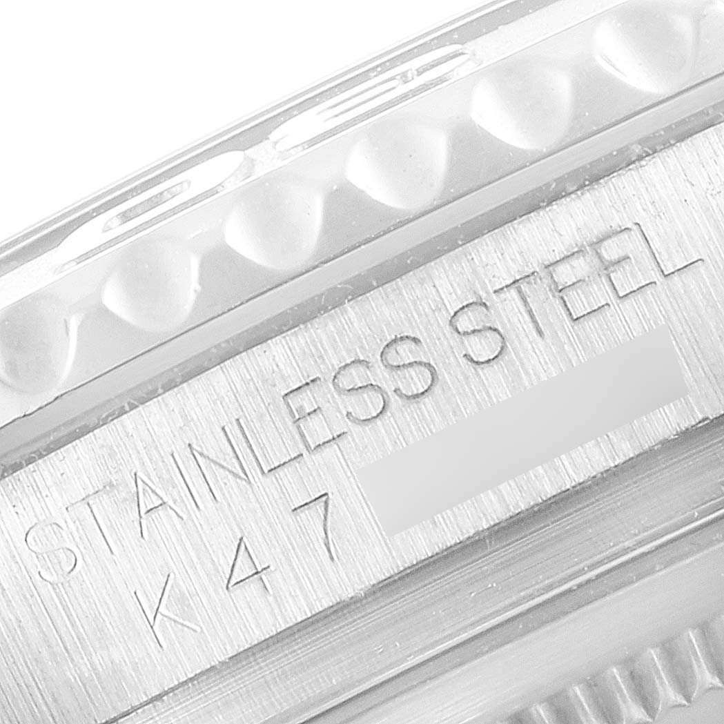 This close-up image shows the side view of the bezel and case, including the "STAINLESS STEEL" and model details of the Rolex Yacht-Master 16622 Men's Stainless Steel Silver Dial 16622 Men's Stainless Steel Silver Dial watch.