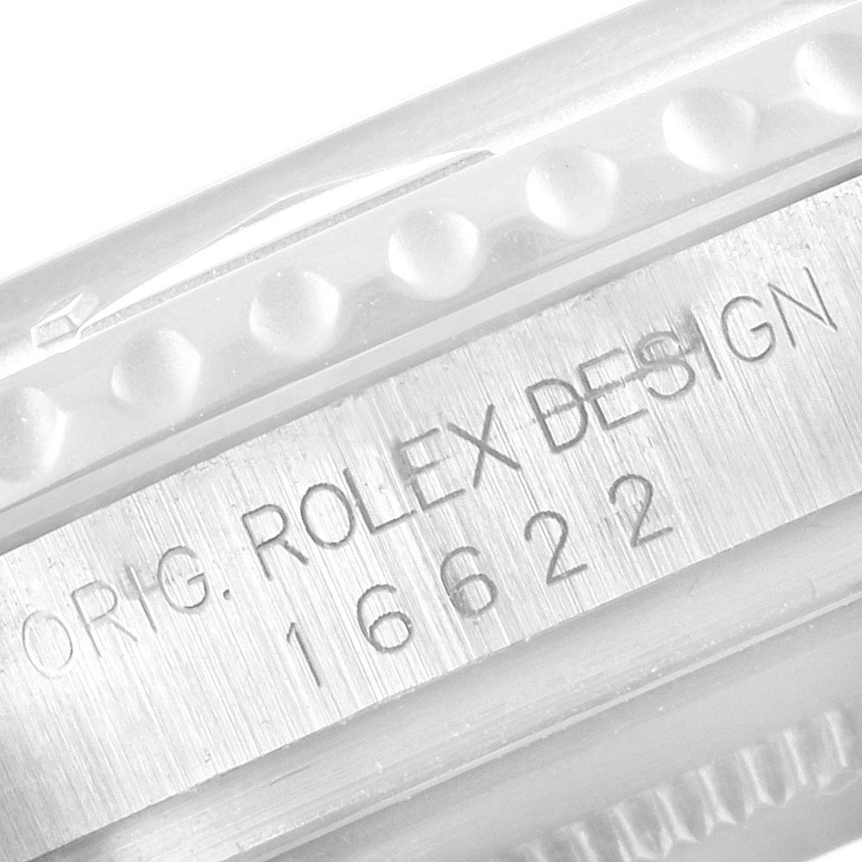 This close-up image shows the edge and the engraved serial number "16622" of the Rolex Yacht-Master 16622 Men
s Stainless Steel Silver Dial 16622 Men
s Stainless Steel Silver Dial watch.