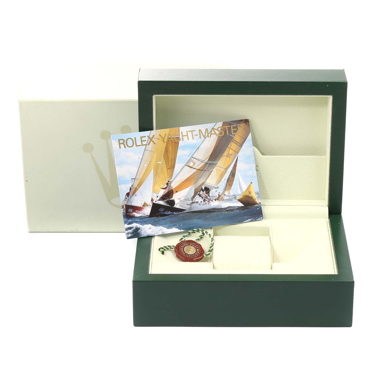 The image shows an open Rolex Yacht-Master 16622 Men
s Stainless Steel Silver Dial 16622 Men
s Stainless Steel Silver Dial watch box, a booklet, and an Best Quality
ity tag.