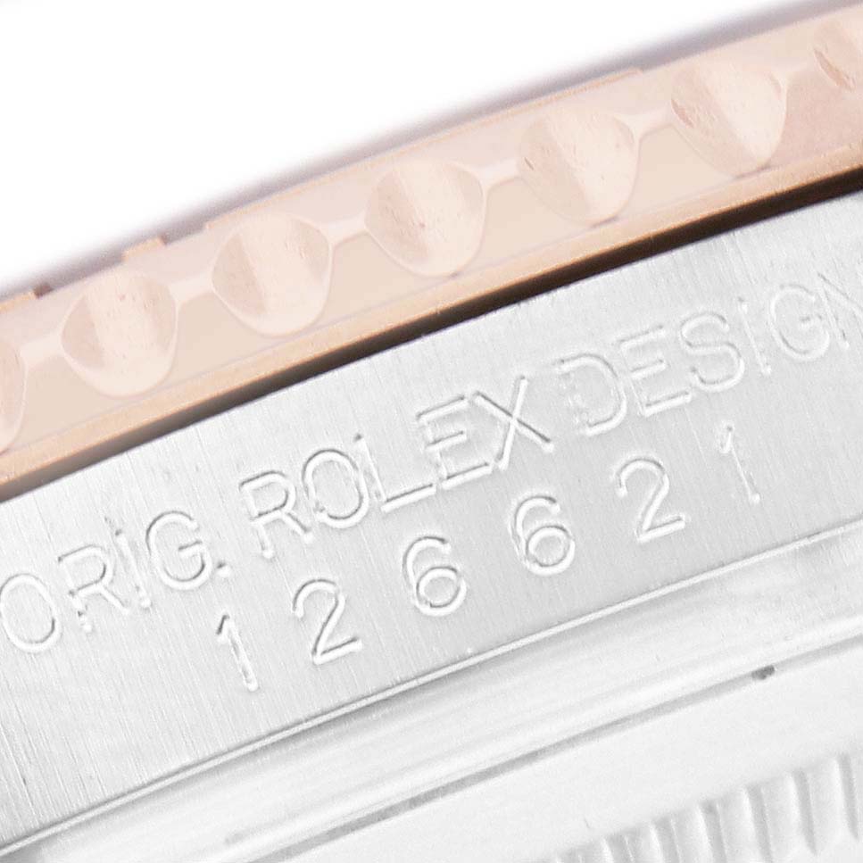 The image shows a close-up of the Rolex Yacht-Master 126621 Men's Stainless Steel Black Dial bezel and engraved model number on the case.