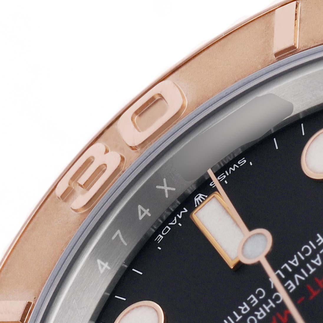 The image shows a close-up of the Rolex Yacht-Master 126621 Men's Stainless Steel Black Dial bezel, with part of the dial and markers visible.