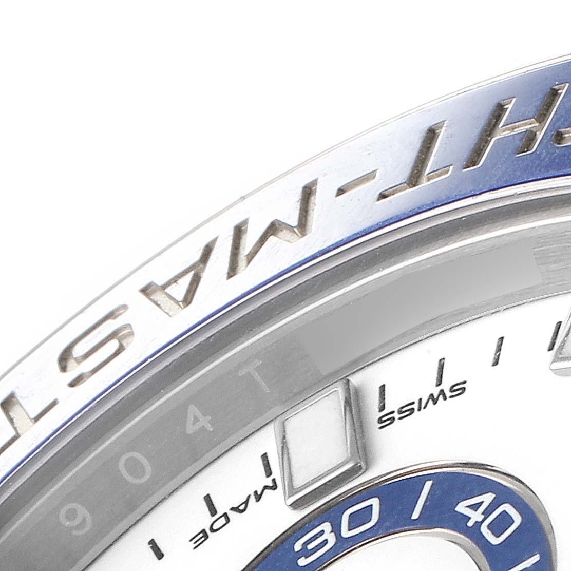 The image shows a close-up of the bezel and part of the dial of a Rolex Yacht-Master 116680 Men's Stainless Steel White Dial 116680 Men's Stainless Steel White Dial watch.