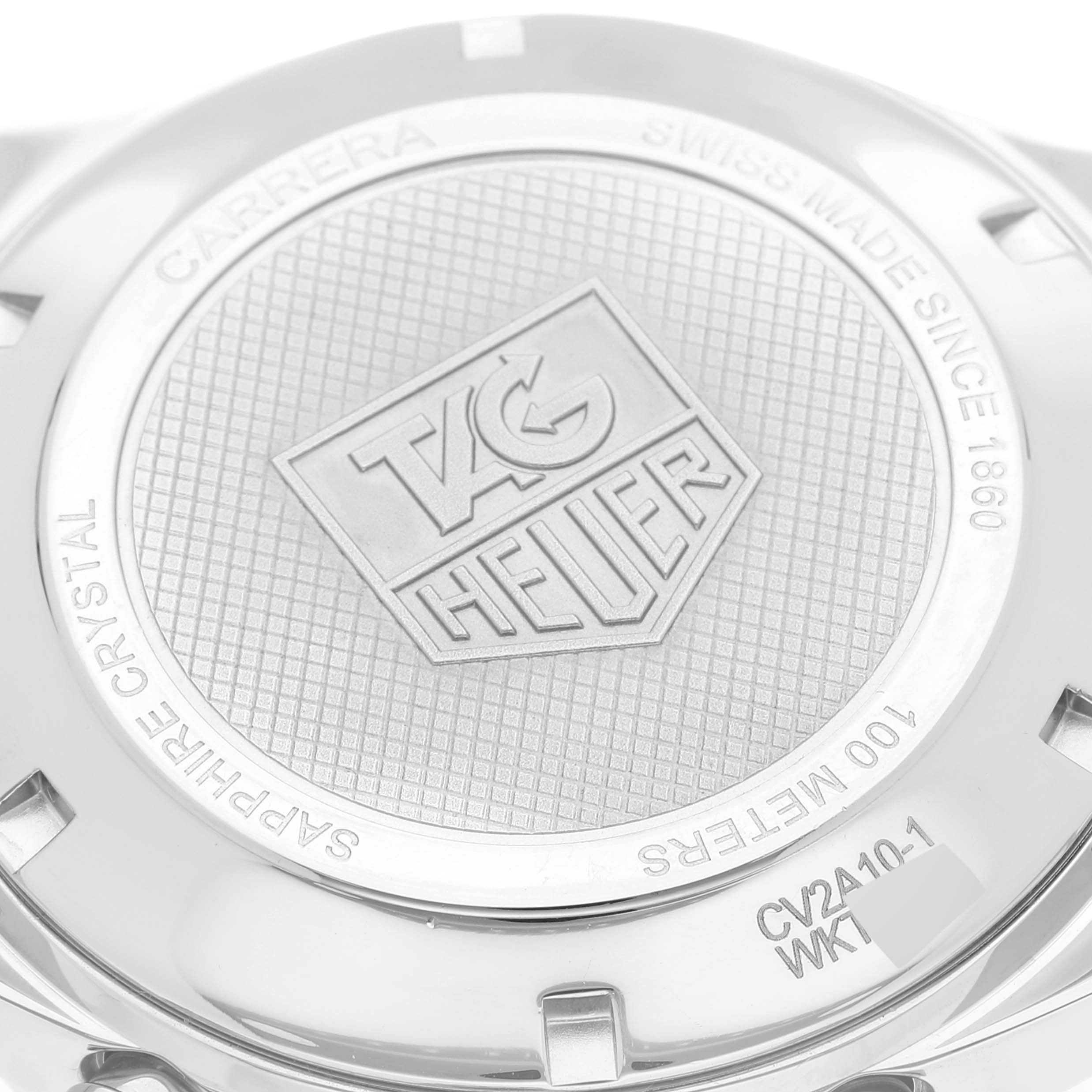 The image shows the back cover of a Tag Heuer Carrera CV2A10.BA0796 Men's Stainless Steel Black Dial CV2A10.BA0796 Men's Stainless Steel Black Dial watch, displaying the brand logo and specifications.