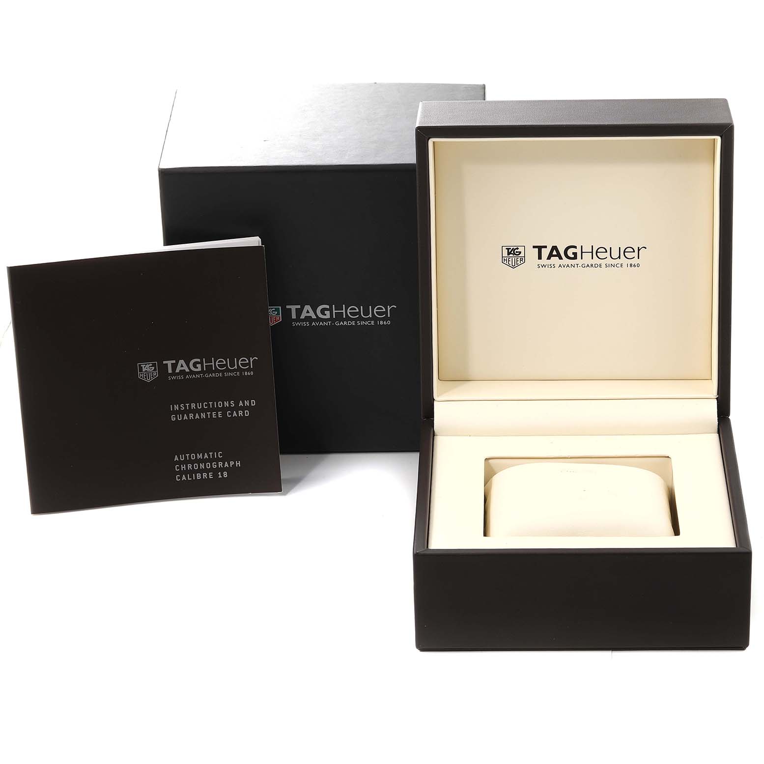 The image shows the Tag Heuer Carrera CV2A10.BA0796 Men's Stainless Steel Black Dial CV2A10.BA0796 Men's Stainless Steel Black Dial model's packaging, including the box, open case, and instruction manual.