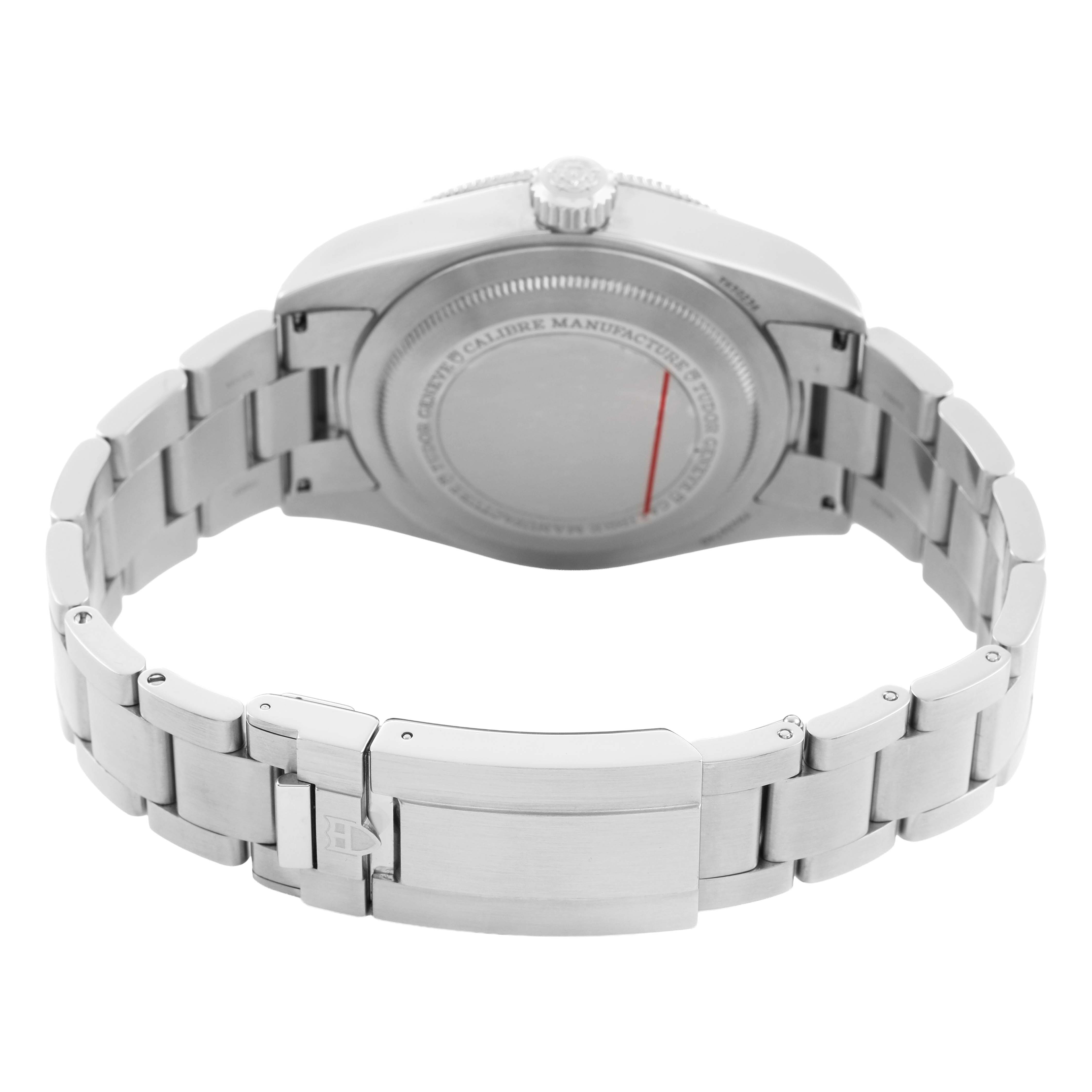 The image shows the back view of a Tudor Heritage Black Bay 7943A1A0NU Men's Stainless Steel Silver Dial watch, highlighting the stainless steel bracelet and clasp.