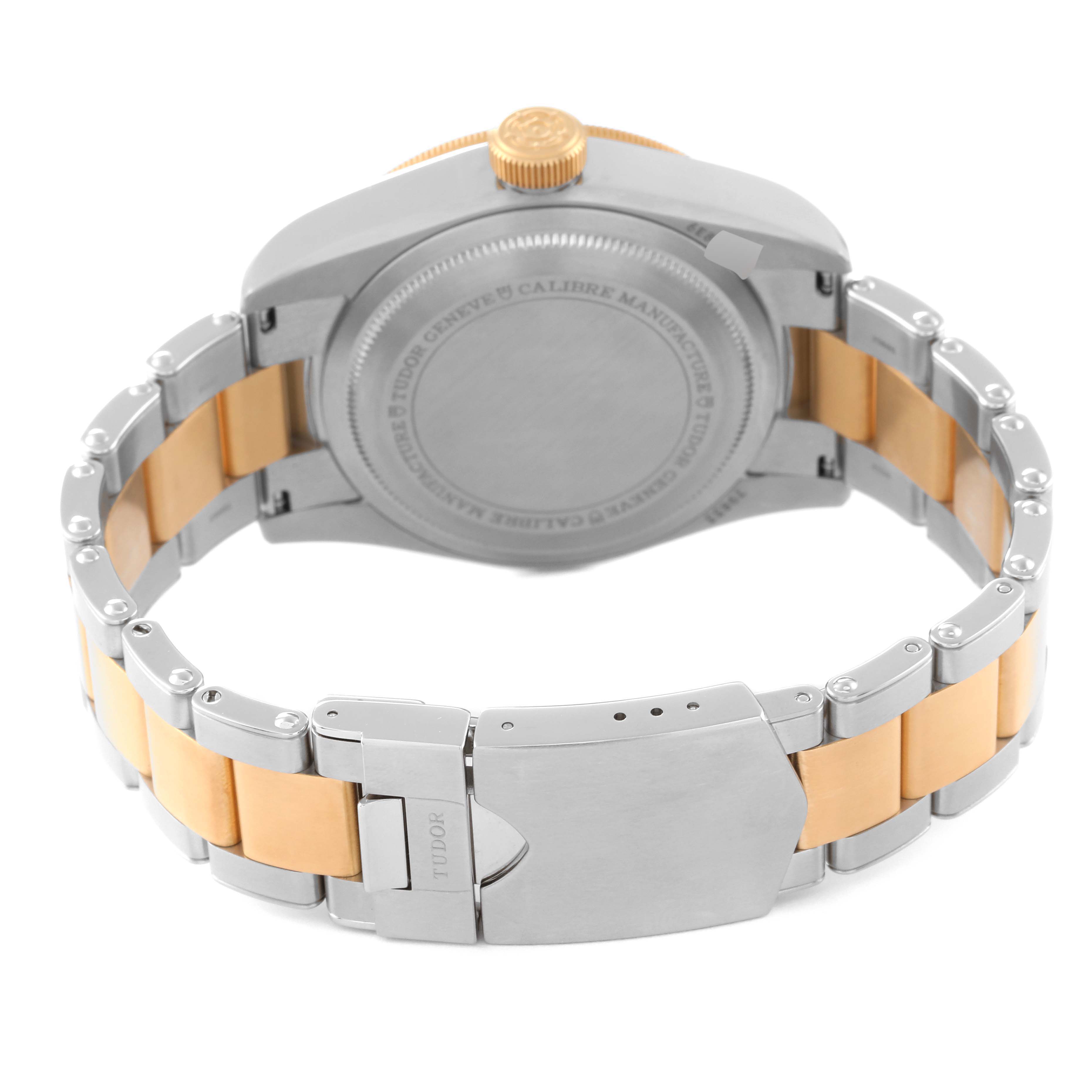 This image shows the rear view of the Tudor Heritage Black Bay 79833MN Men's Steel and Gold (two tone) Black Dial 79833MN Men's Steel and Gold (two tone) Black Dial watch, highlighting the case back, bracelet, and clasp.