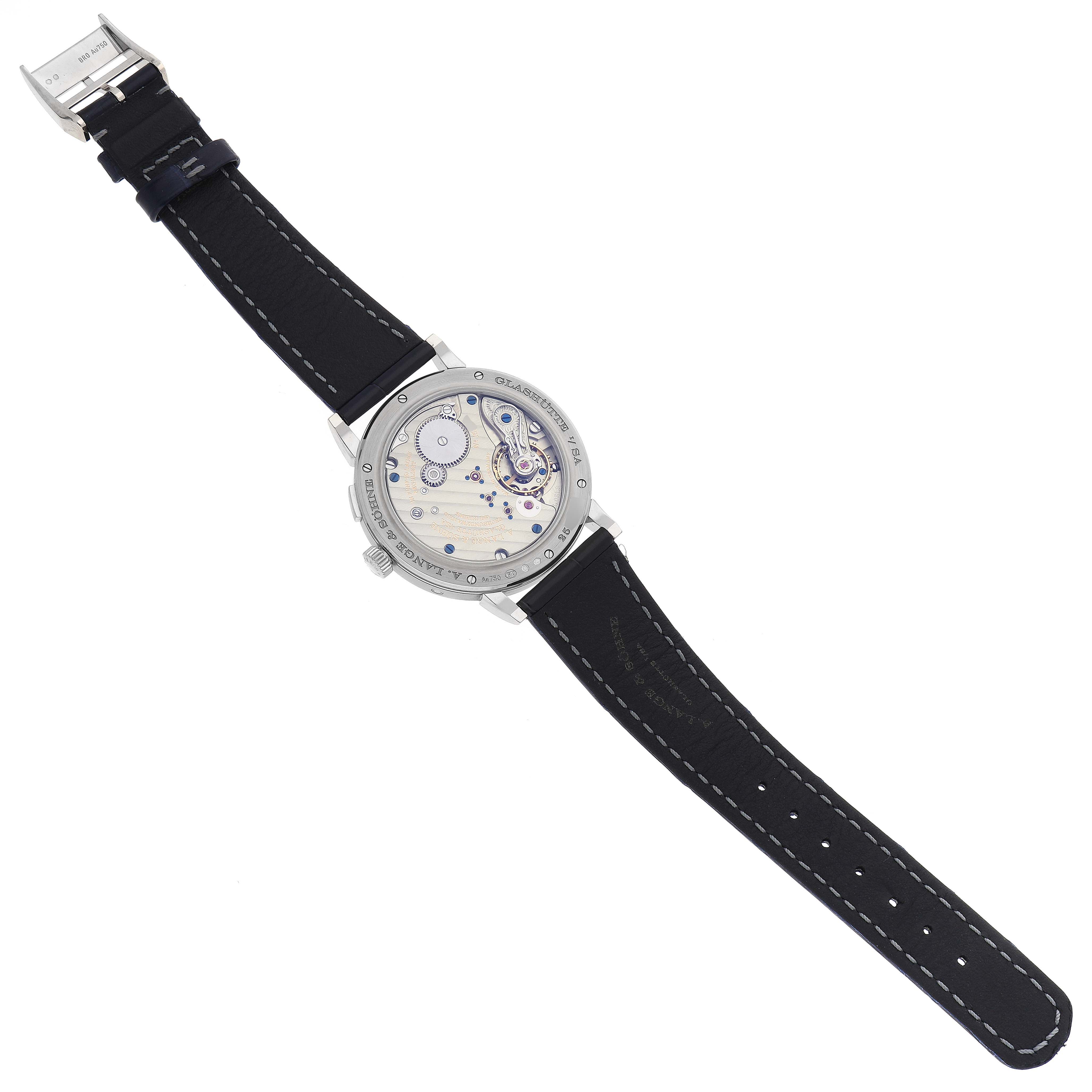 The 1815 model by A. Lange 
Söhne is shown from the back, highlighting the watch movement and leather strap.