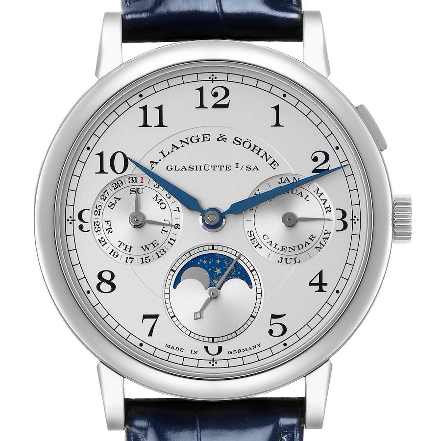 The A. Lange & Söhne 1815 watch is shown from the front, highlighting its dials, moon phase, and blue leather strap.